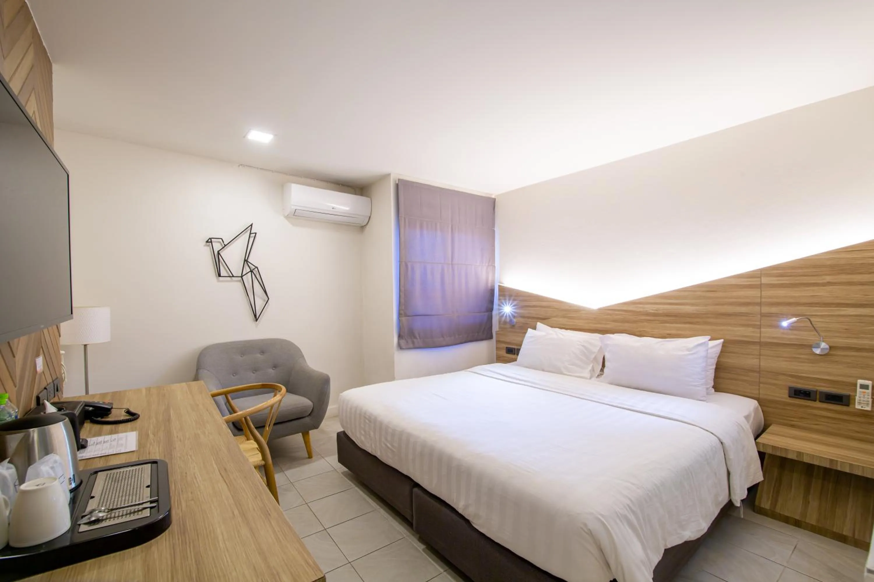 Bed in WE Terminal Hotel