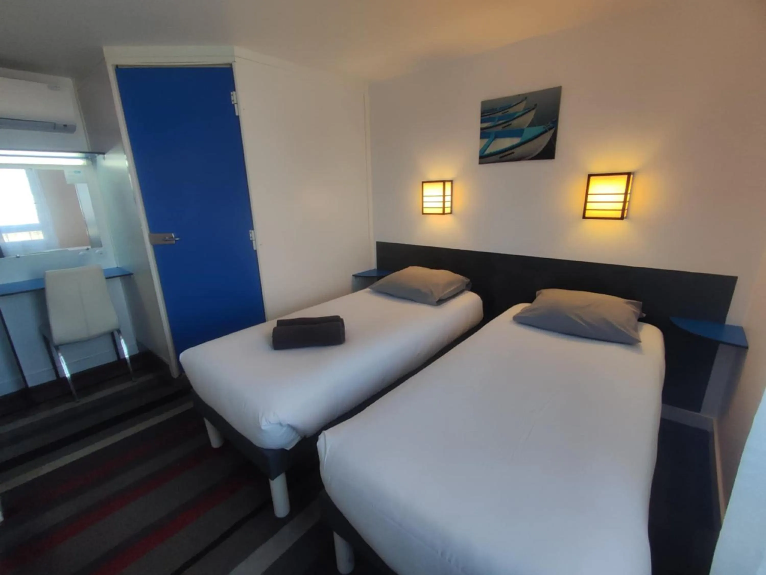 Bed in Kyriad Direct Saintes