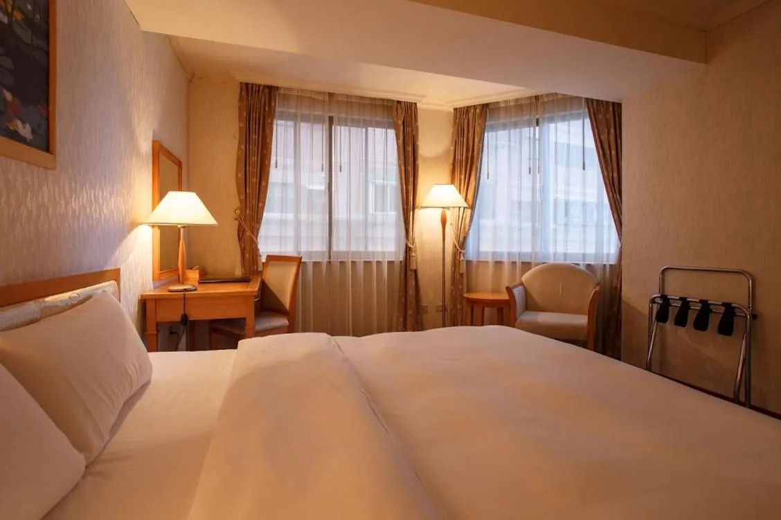 Bed in The Koos Hotel