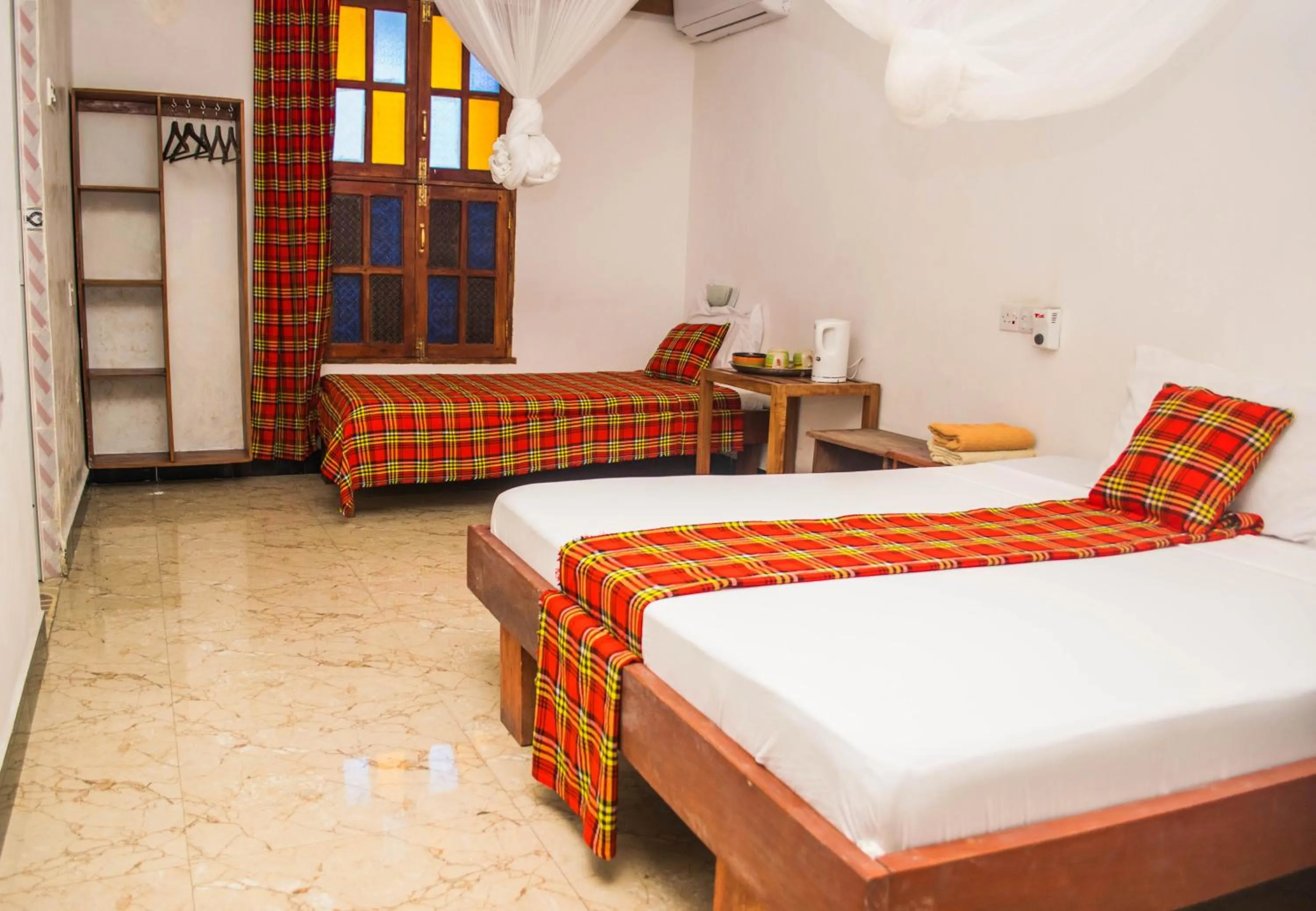 Bed in Stonetown View Hotel