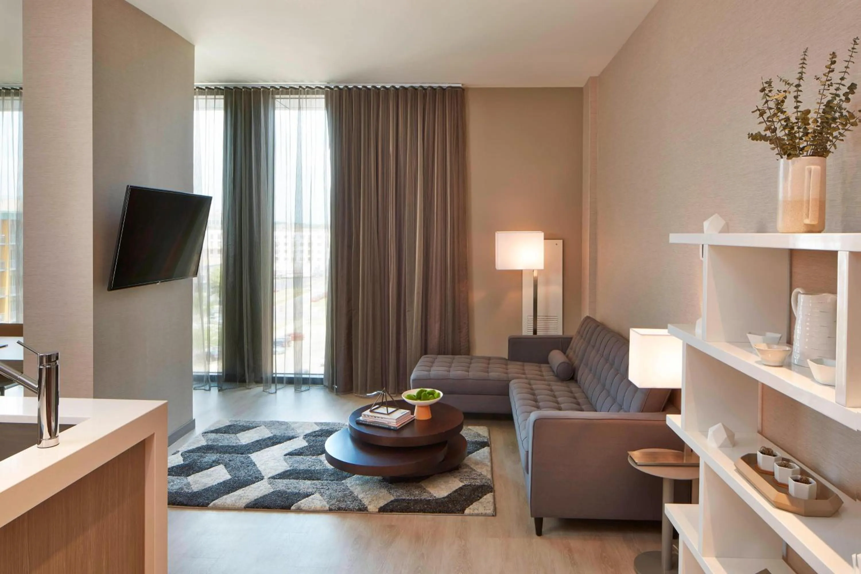 Living room in AC Hotel by Marriott Des Moines East Village