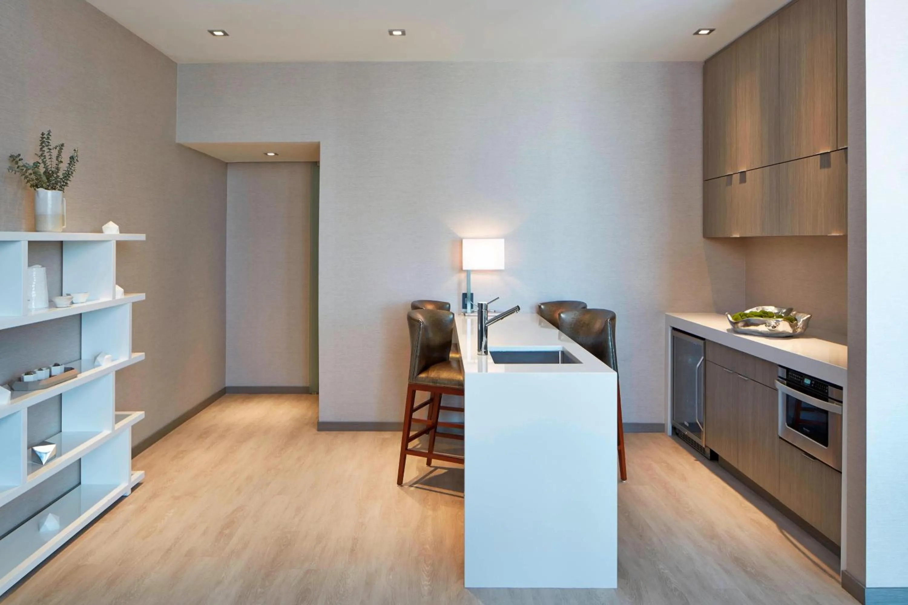 Kitchen or kitchenette in AC Hotel by Marriott Des Moines East Village