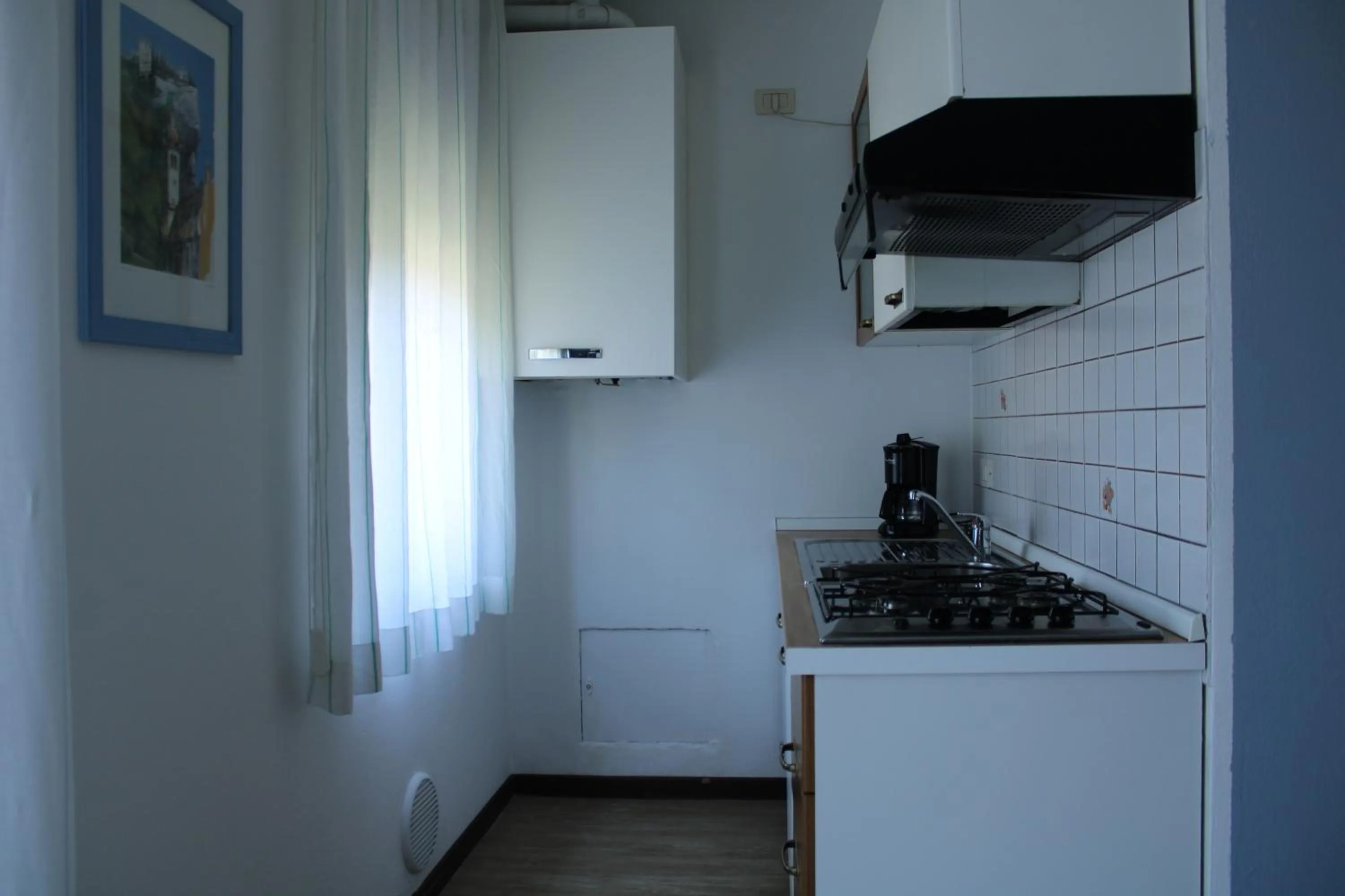 Kitchen or kitchenette in Residence Royal House