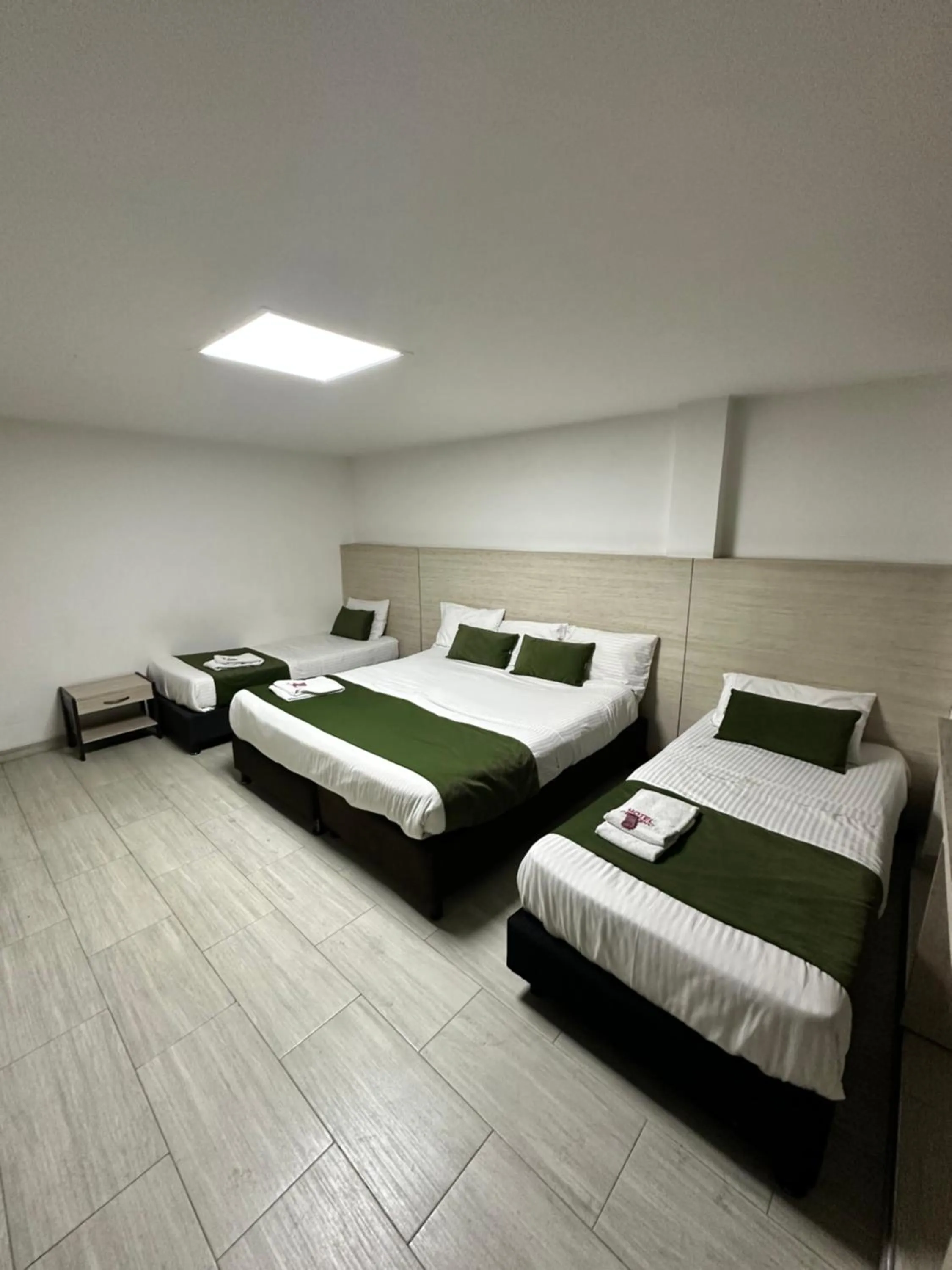 Bed in Hotel Bestmark Platino