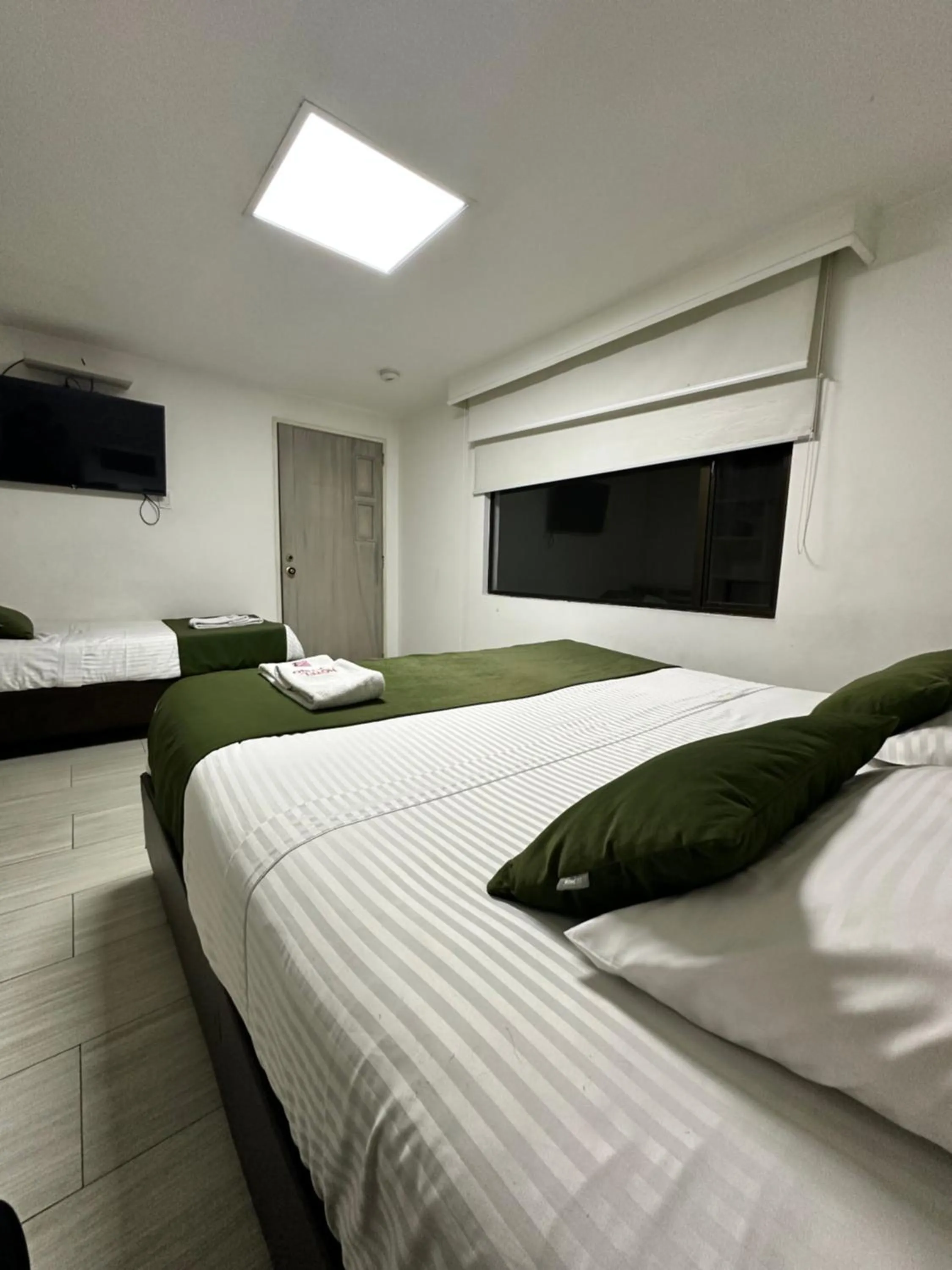 Bed in Hotel Bestmark Platino