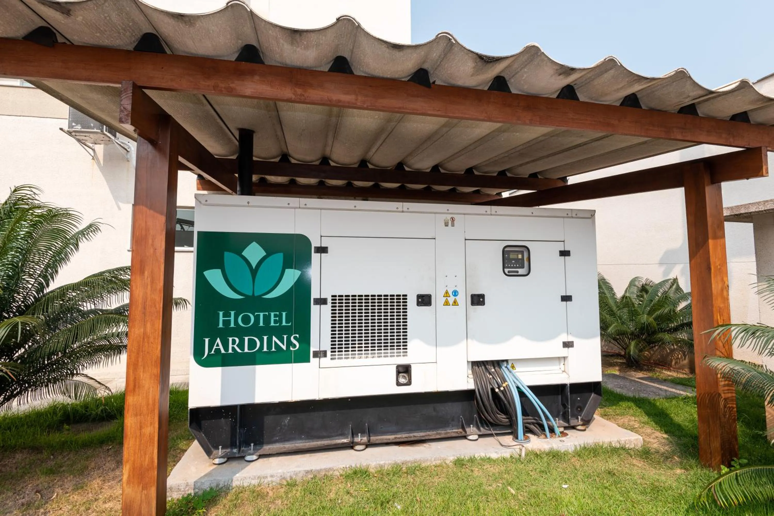 Property logo or sign in Hotel Jardins