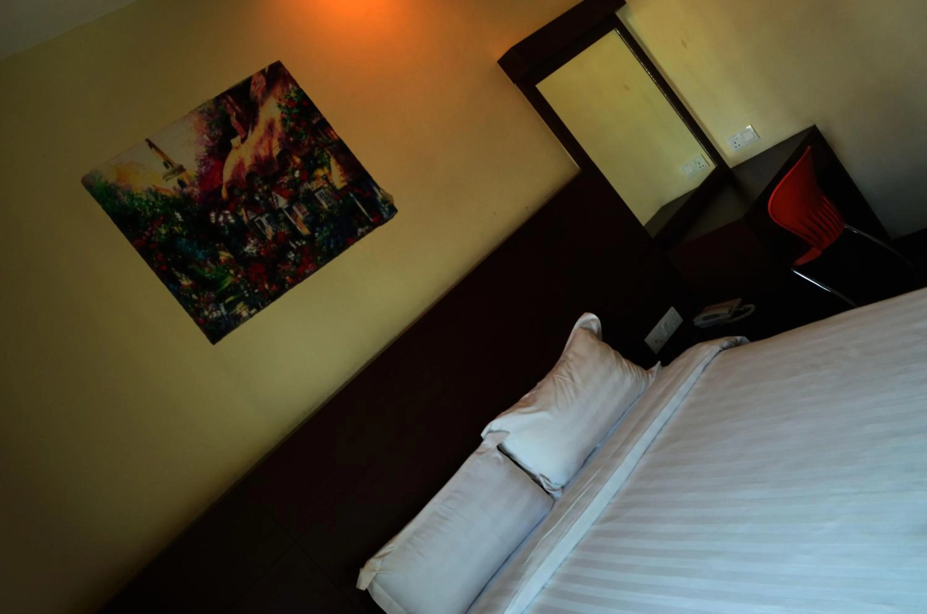 Bed in Lintas Plaza Hotel