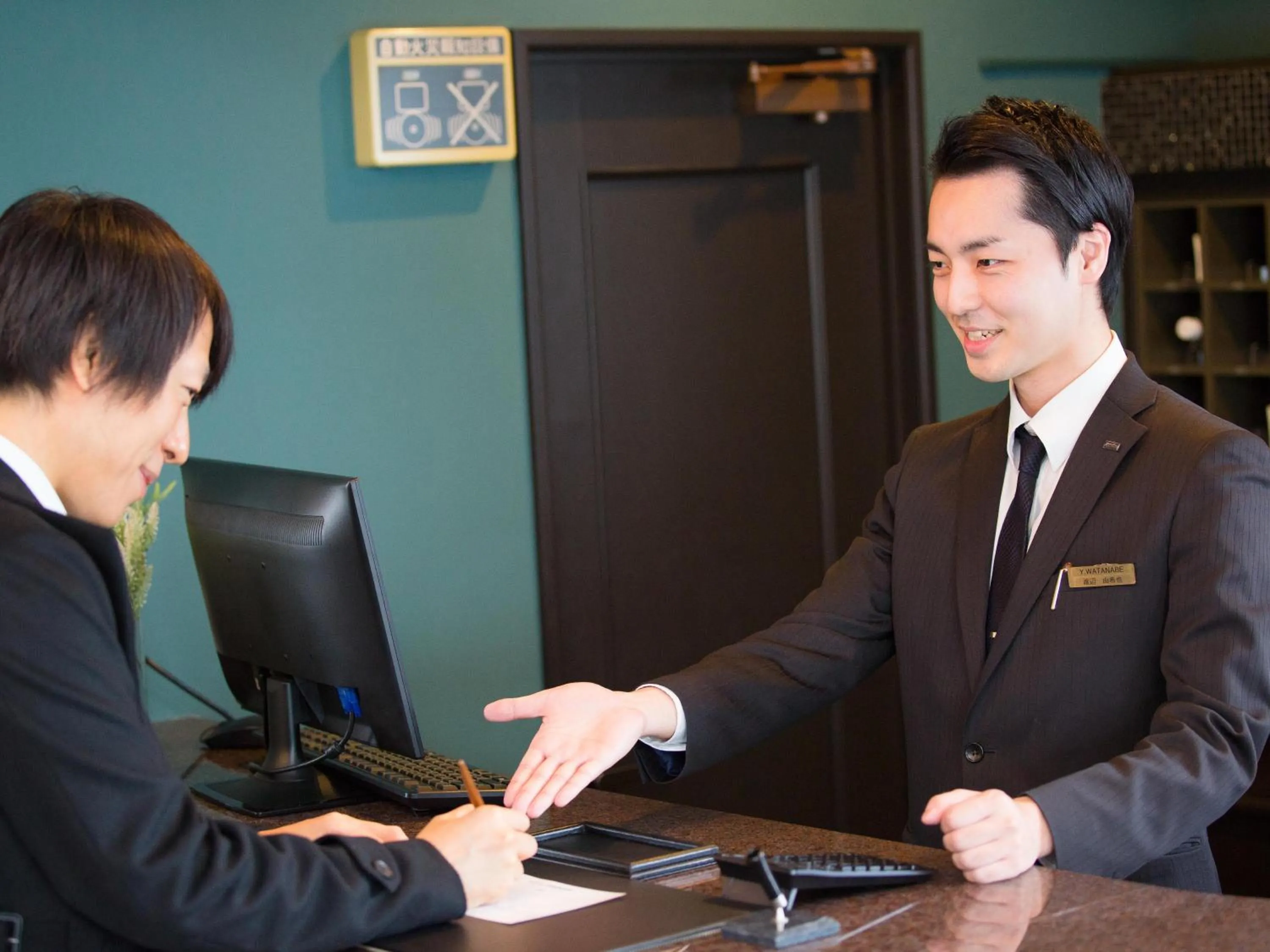 Staff in Hotel AreaOne Nobeoka