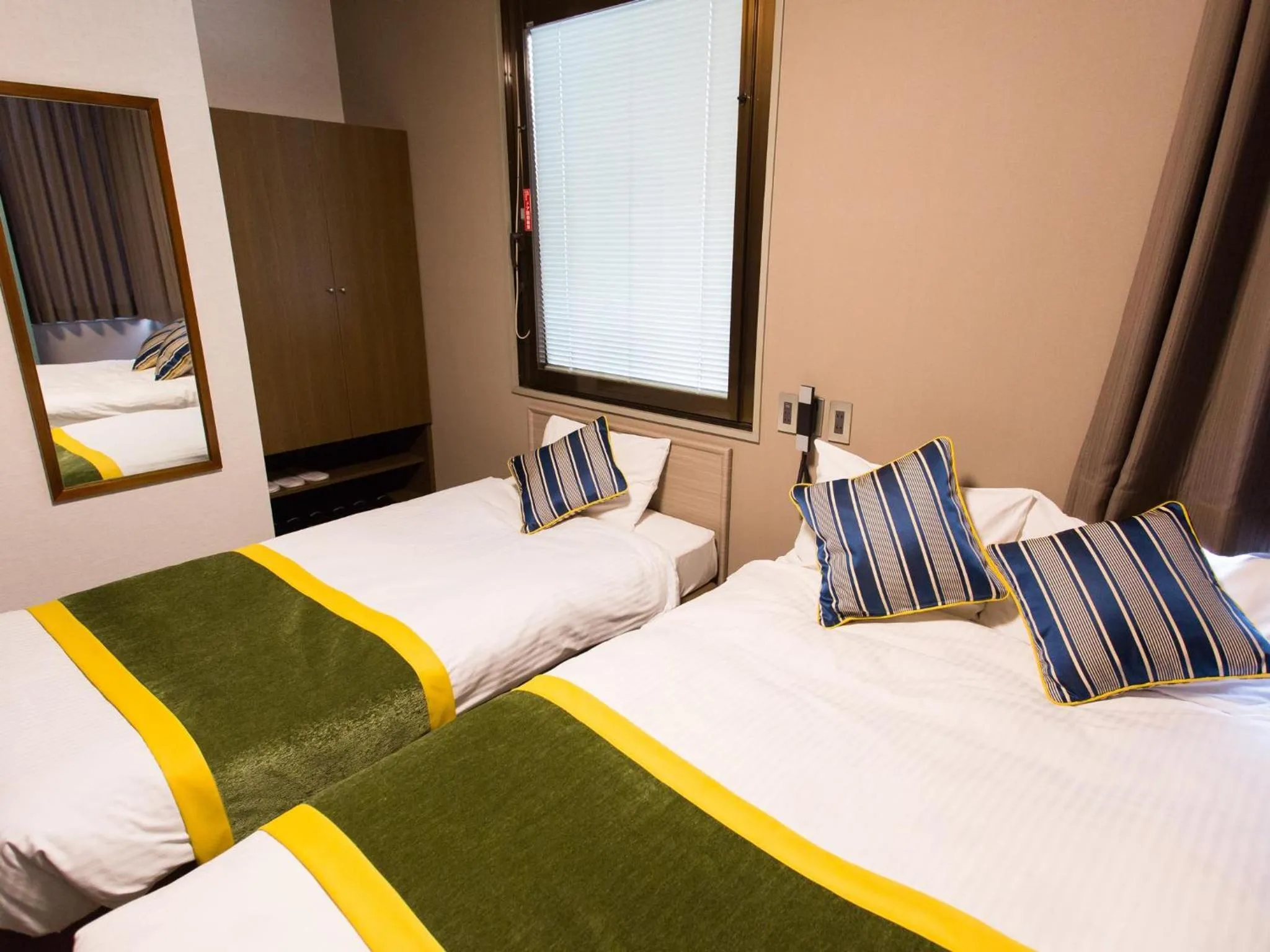 Photo of the whole room, Bed in Hotel AreaOne Nobeoka