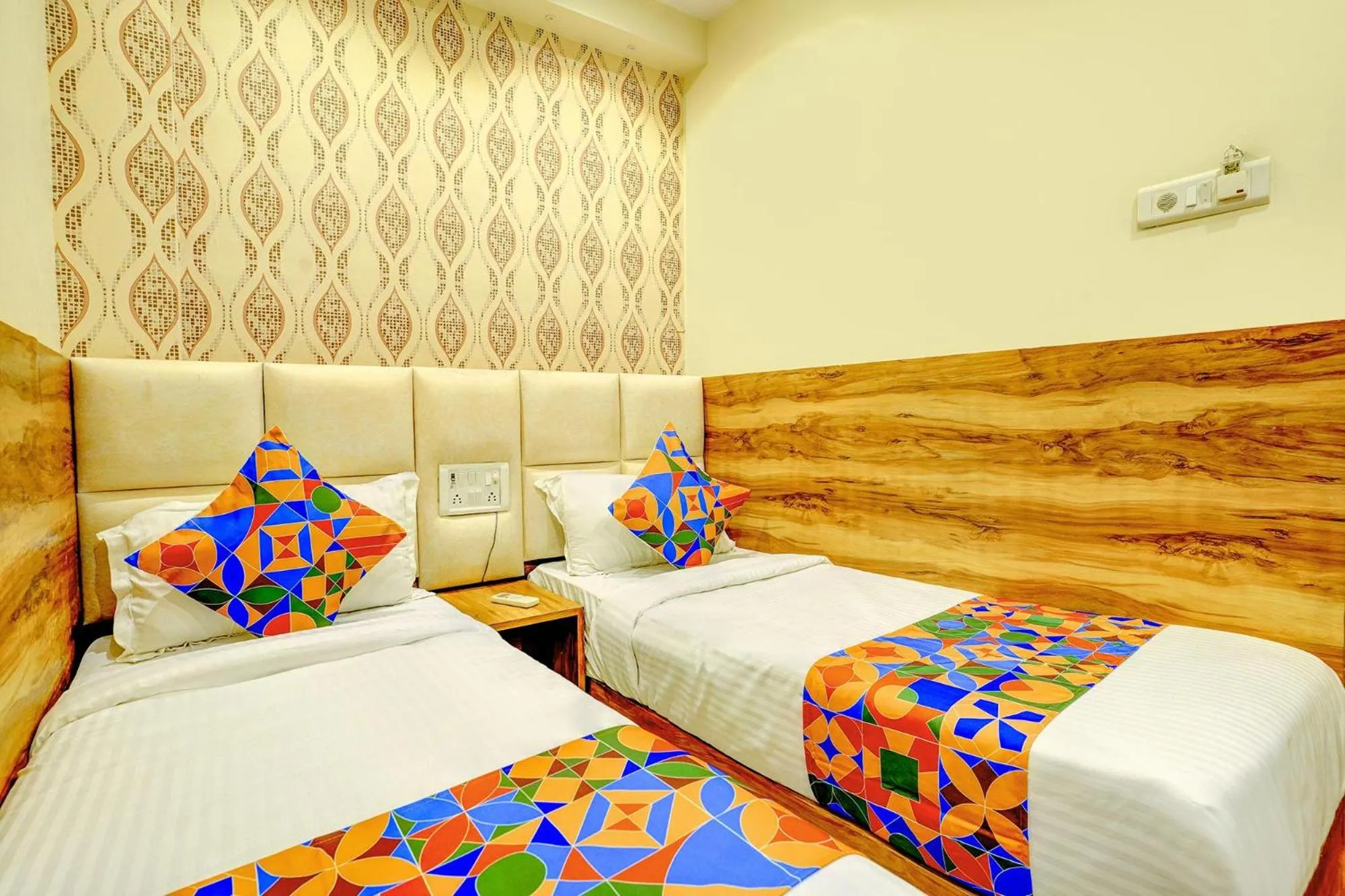 Bed in FabHotel Indore Palace