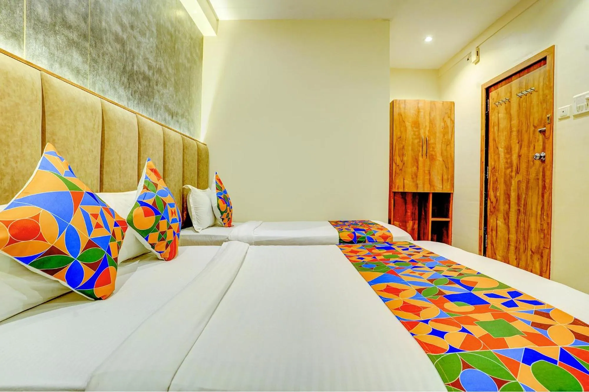 Bed in FabHotel Indore Palace