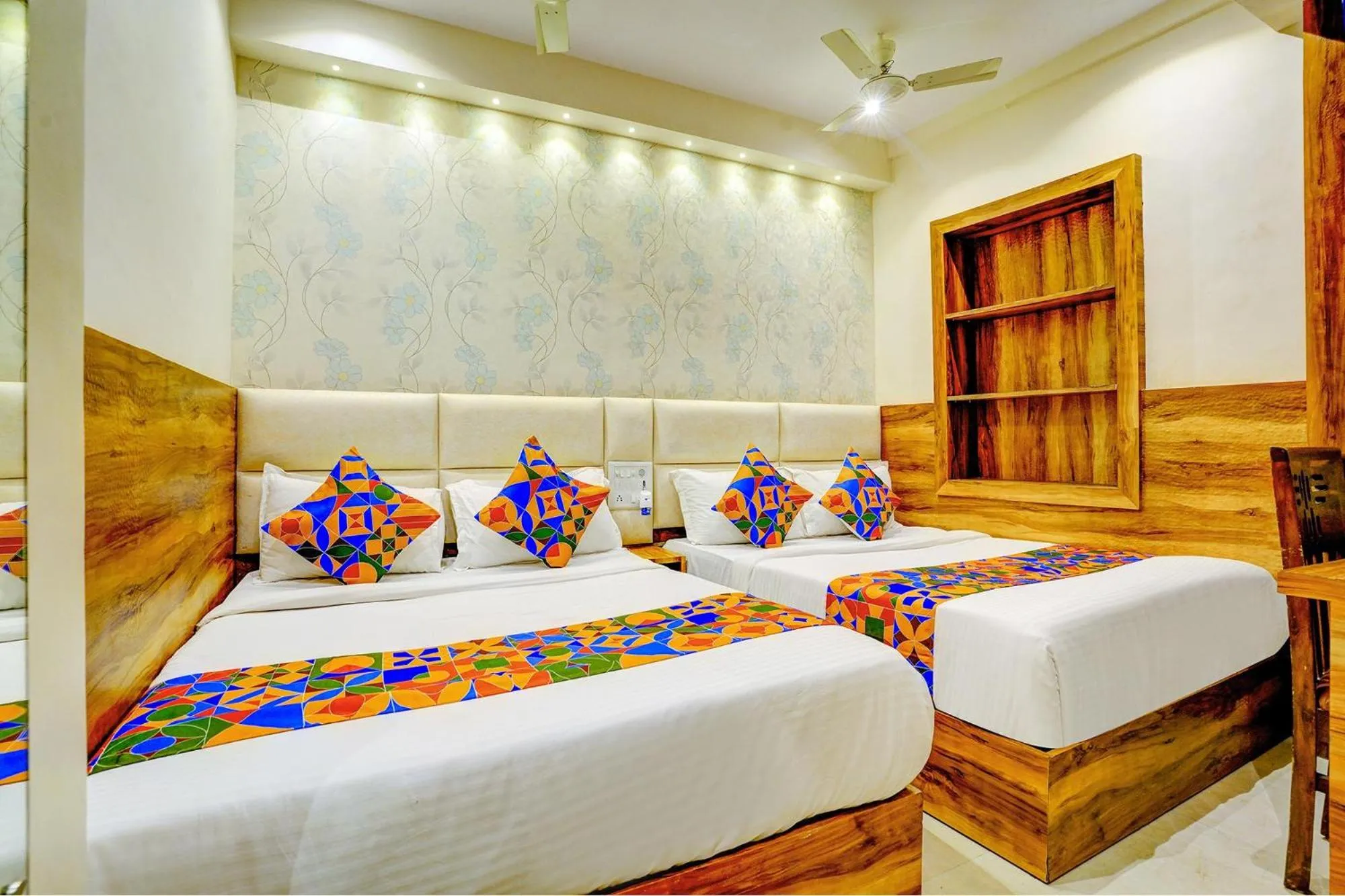Bed in FabHotel Indore Palace