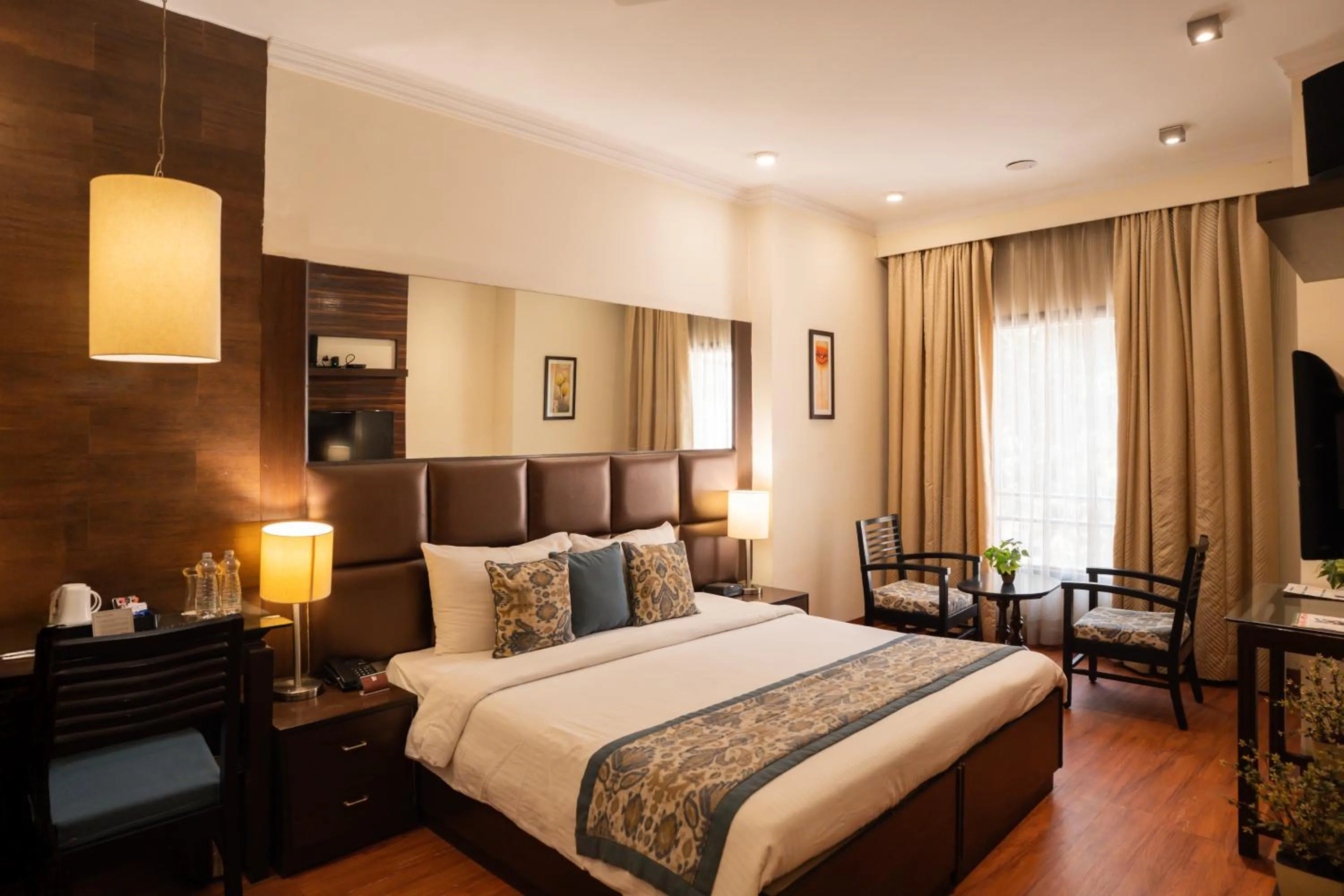 Deluxe Room - single occupancy in Ahuja Residency Cyber City II