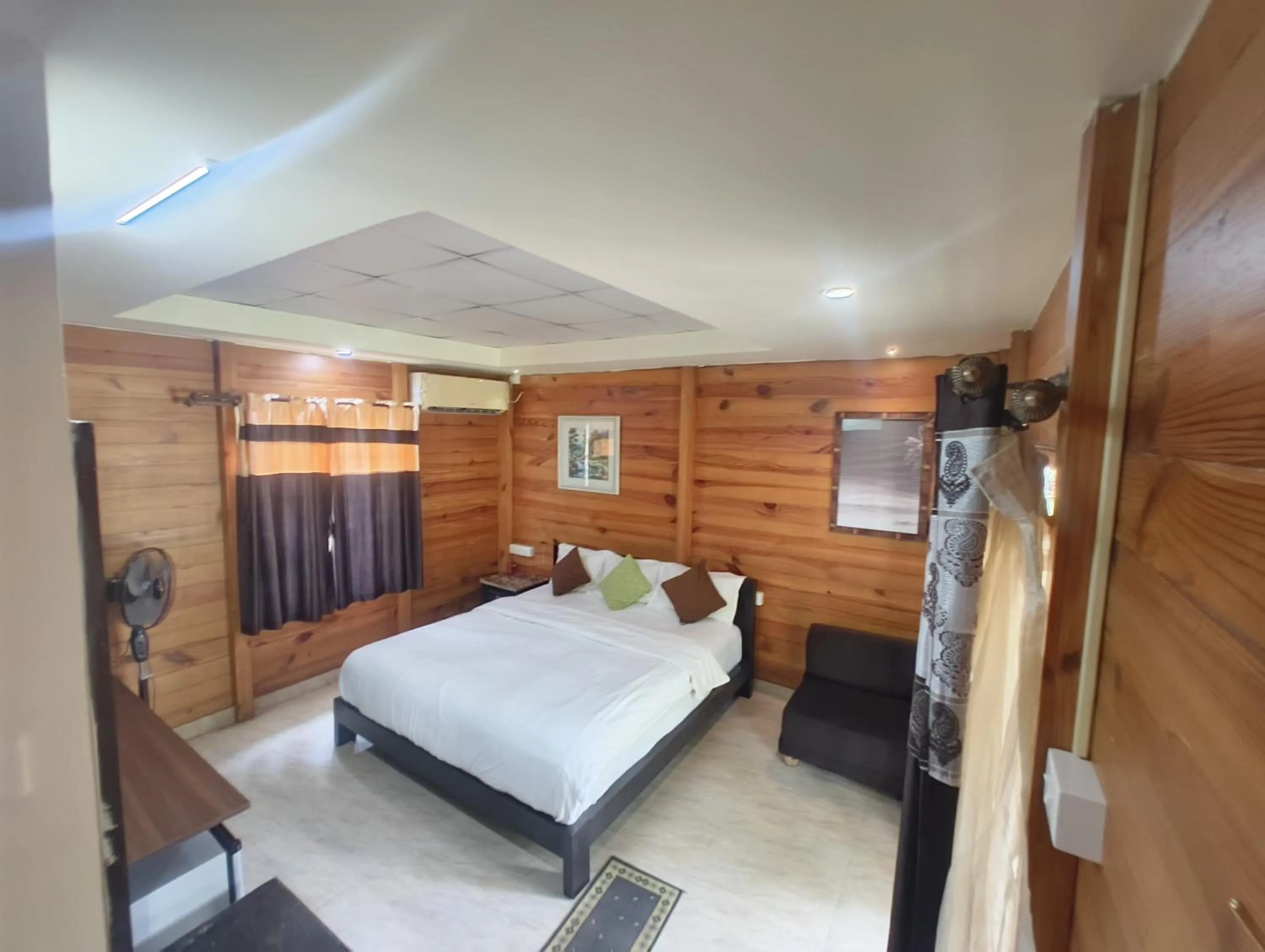 Bed in Go Green Spice & Eco Resort