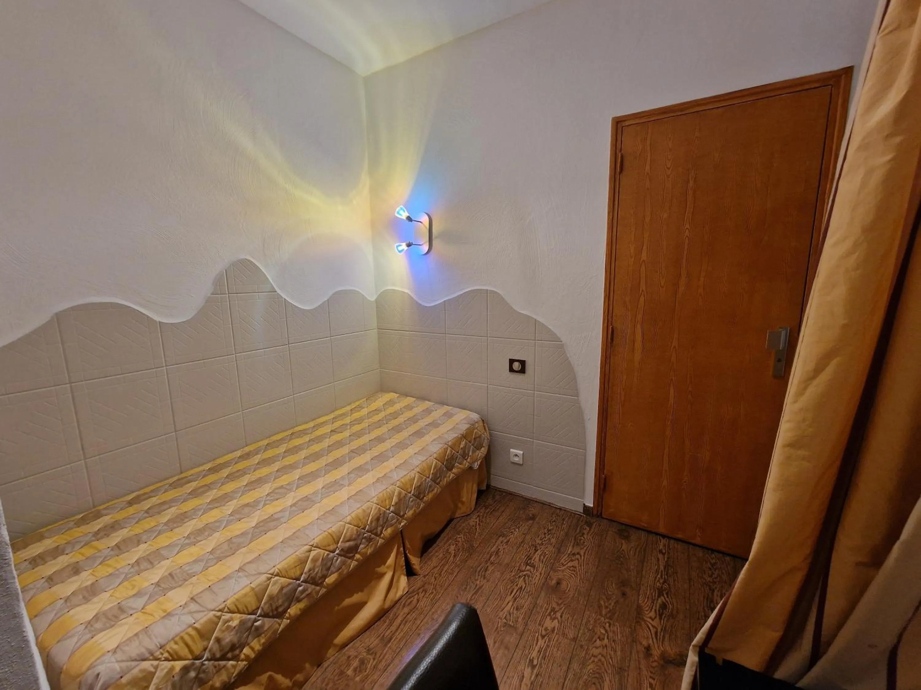 Bed in Hôtel Bella Vista