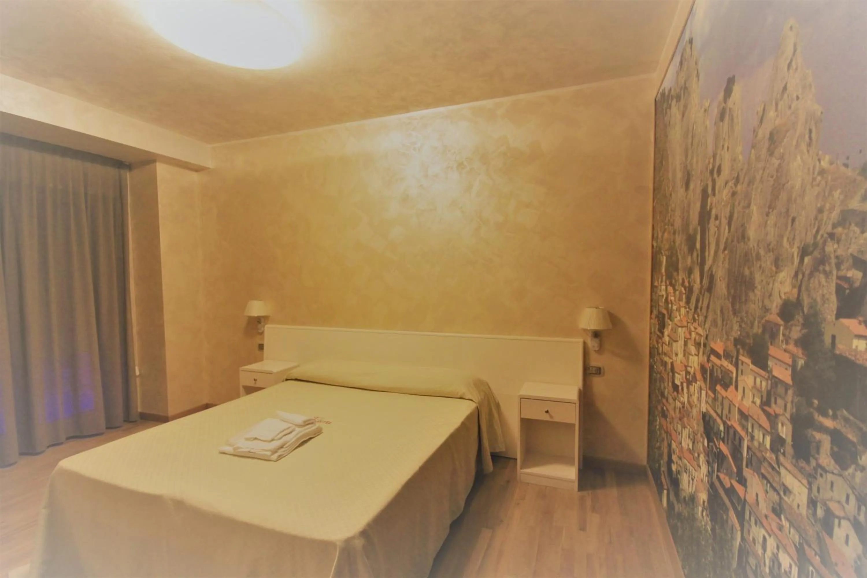 Bedroom in I Rocchi Hotel