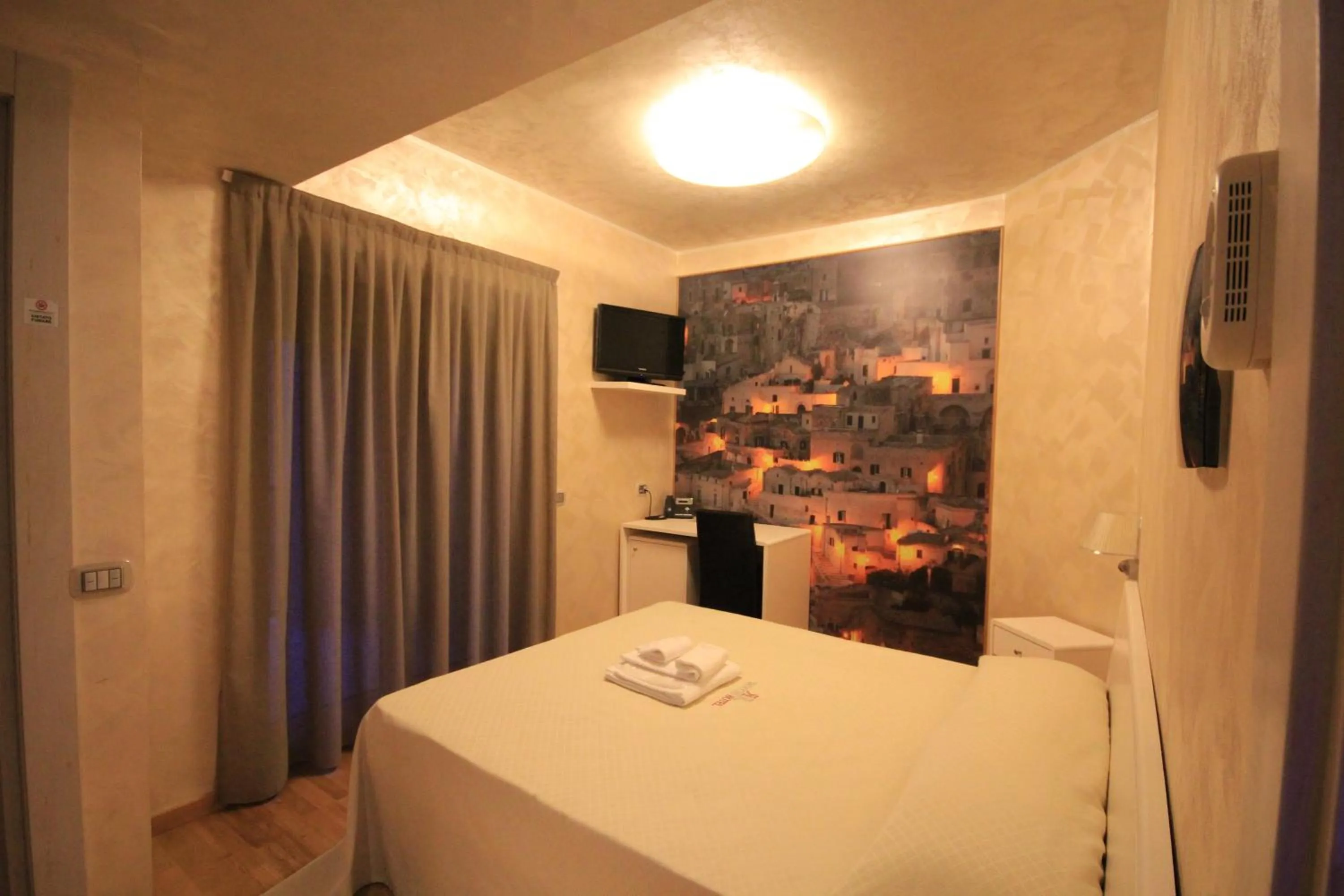 Bedroom in I Rocchi Hotel