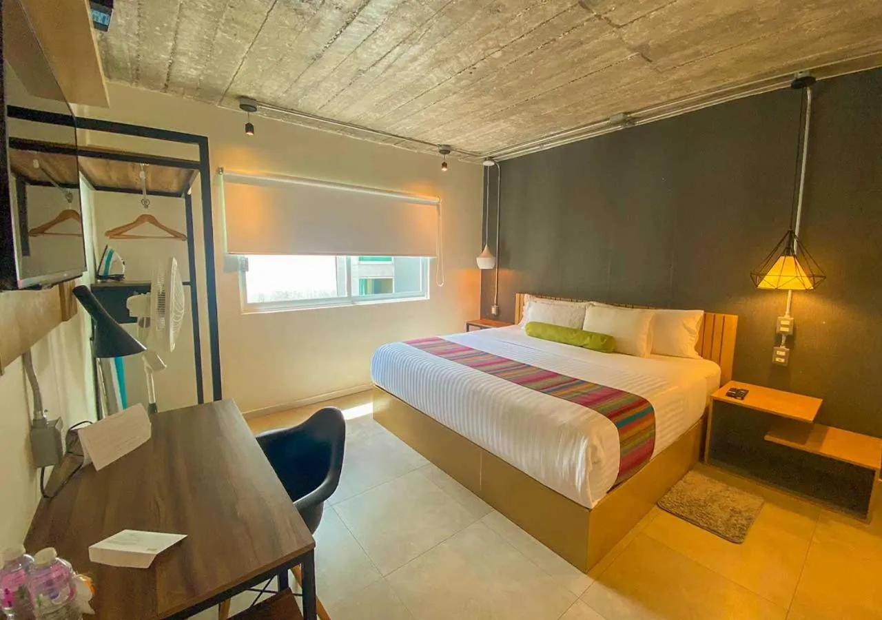 Bed in The Host Business Suites at WTC