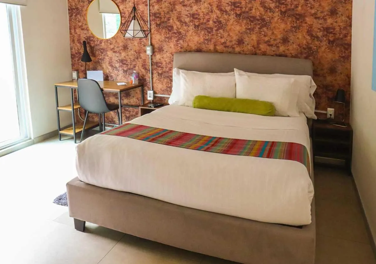 Photo of the whole room, Bed in The Host Business Suites at WTC