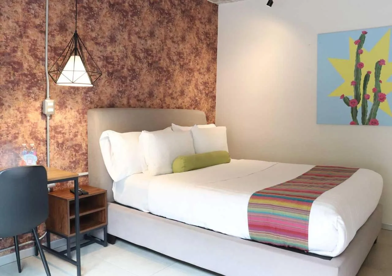 Bedroom, Bed in The Host Business Suites at WTC