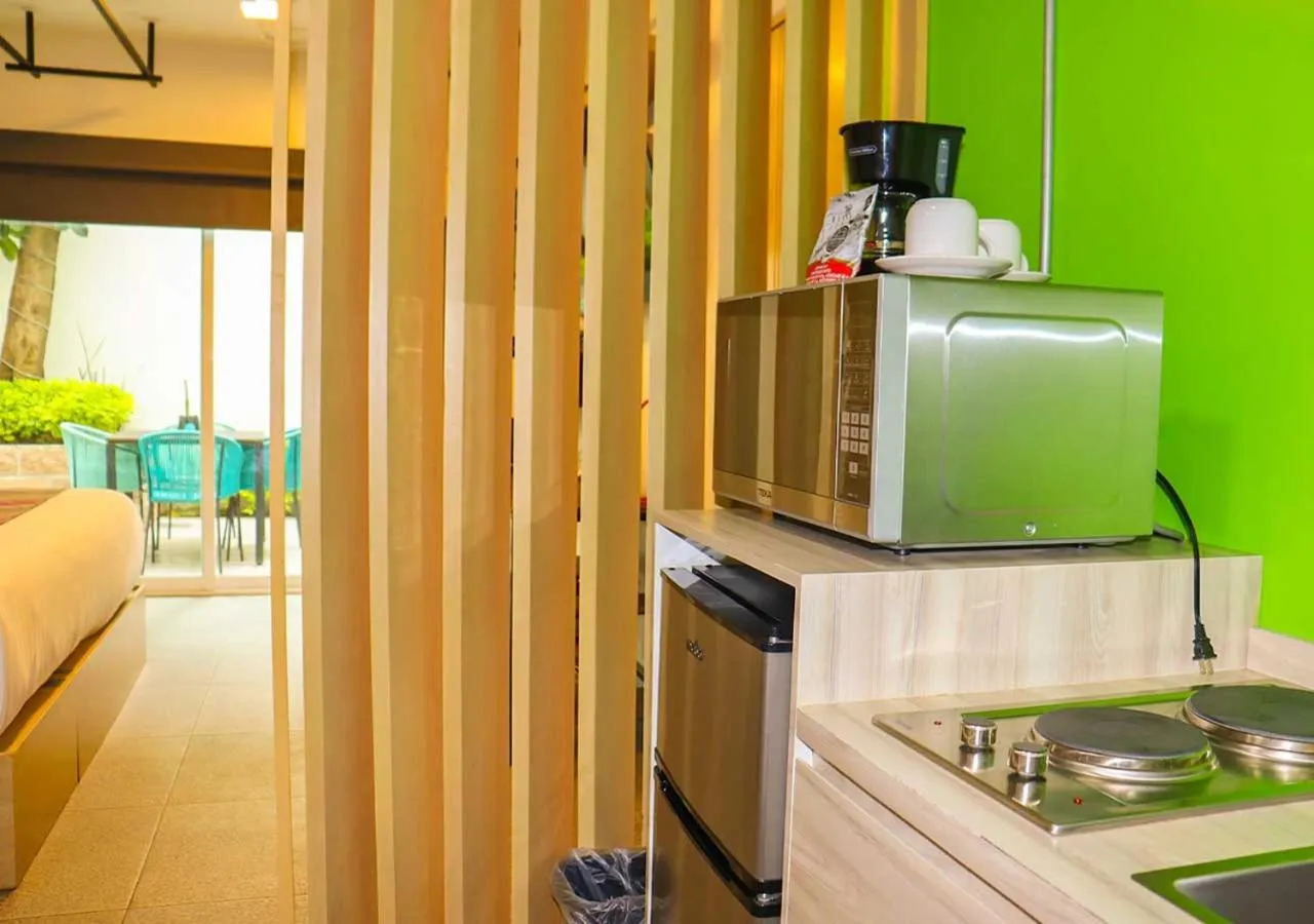 minibar, Bed in The Host Business Suites at WTC