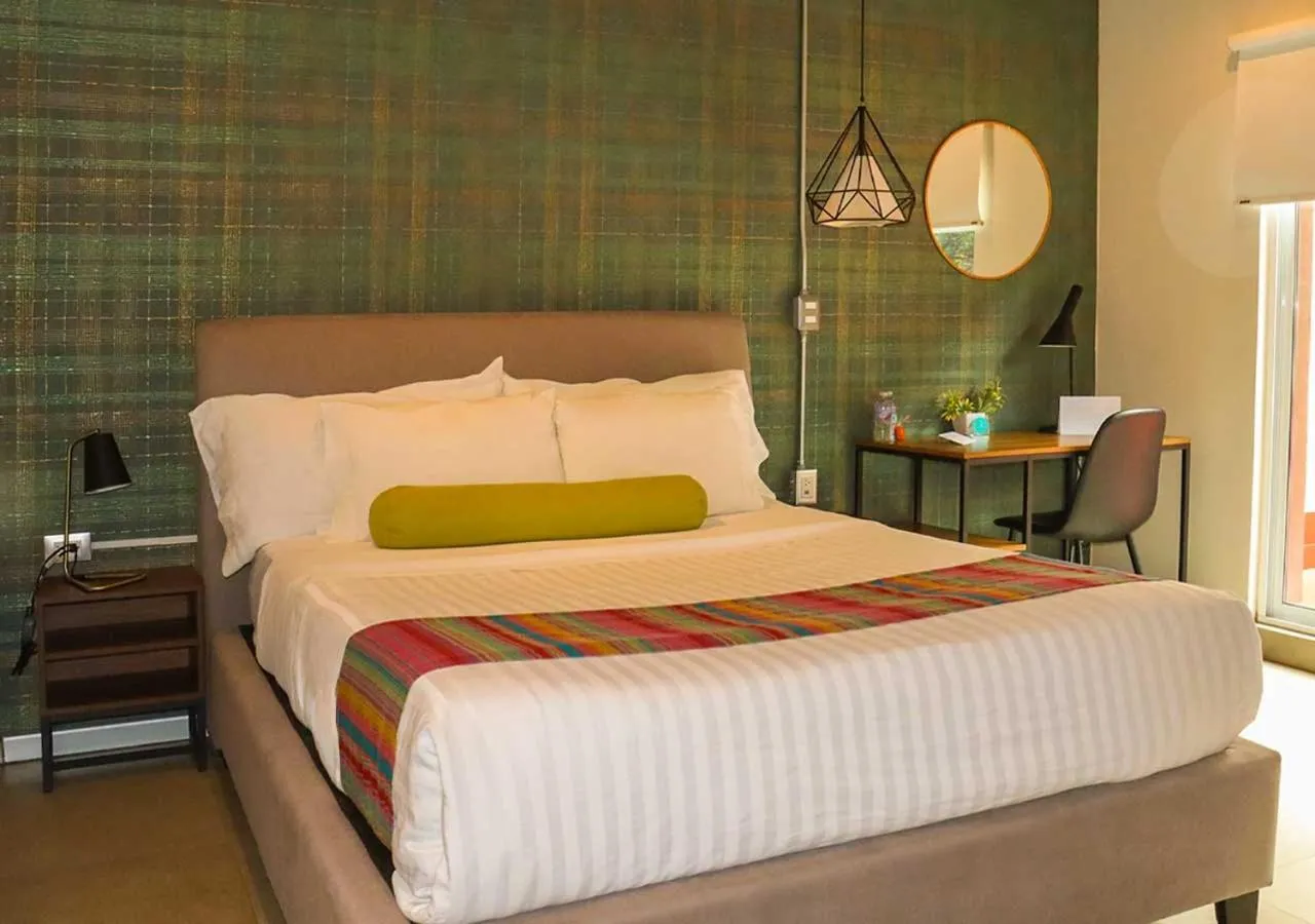 Bed in The Host Business Suites at WTC