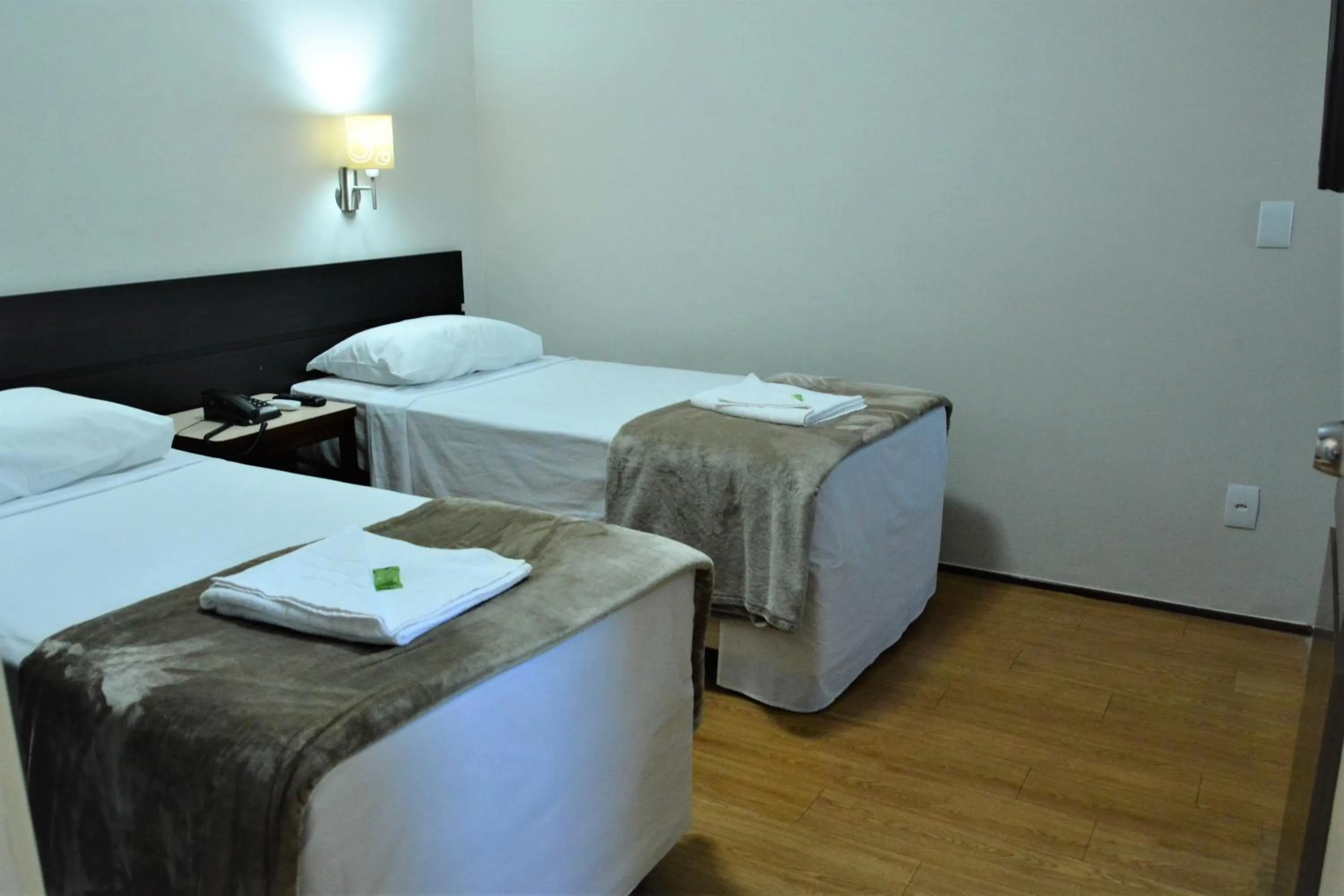 Bed in La Residence Flat Hotel