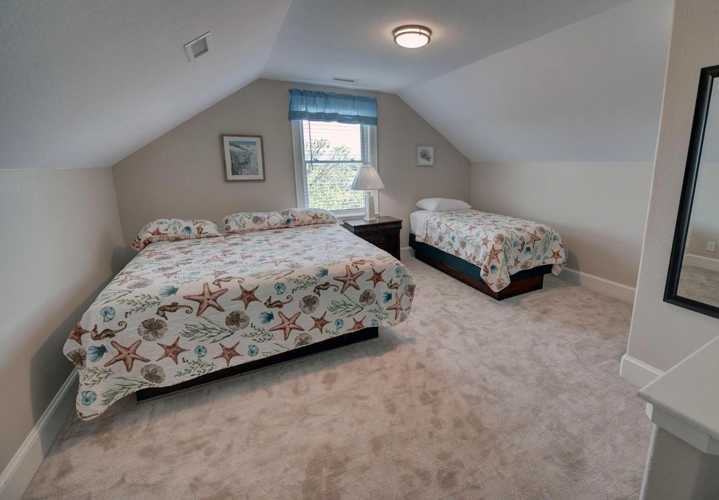 Bed in Outer Banks Motel - Village Accommodations