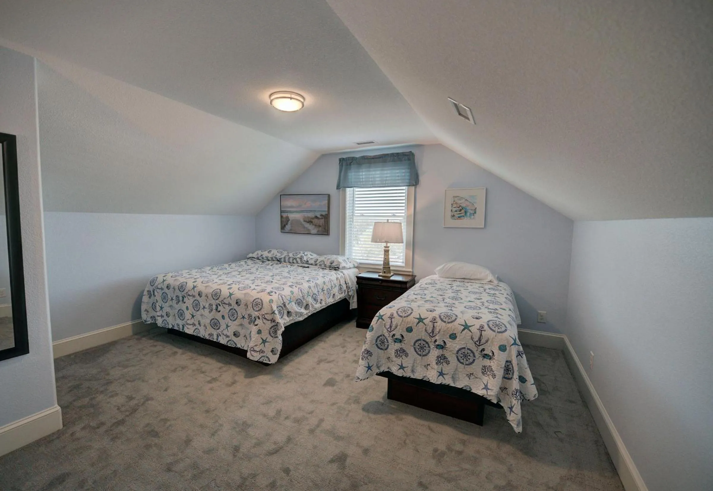 Bed in Outer Banks Motel - Village Accommodations