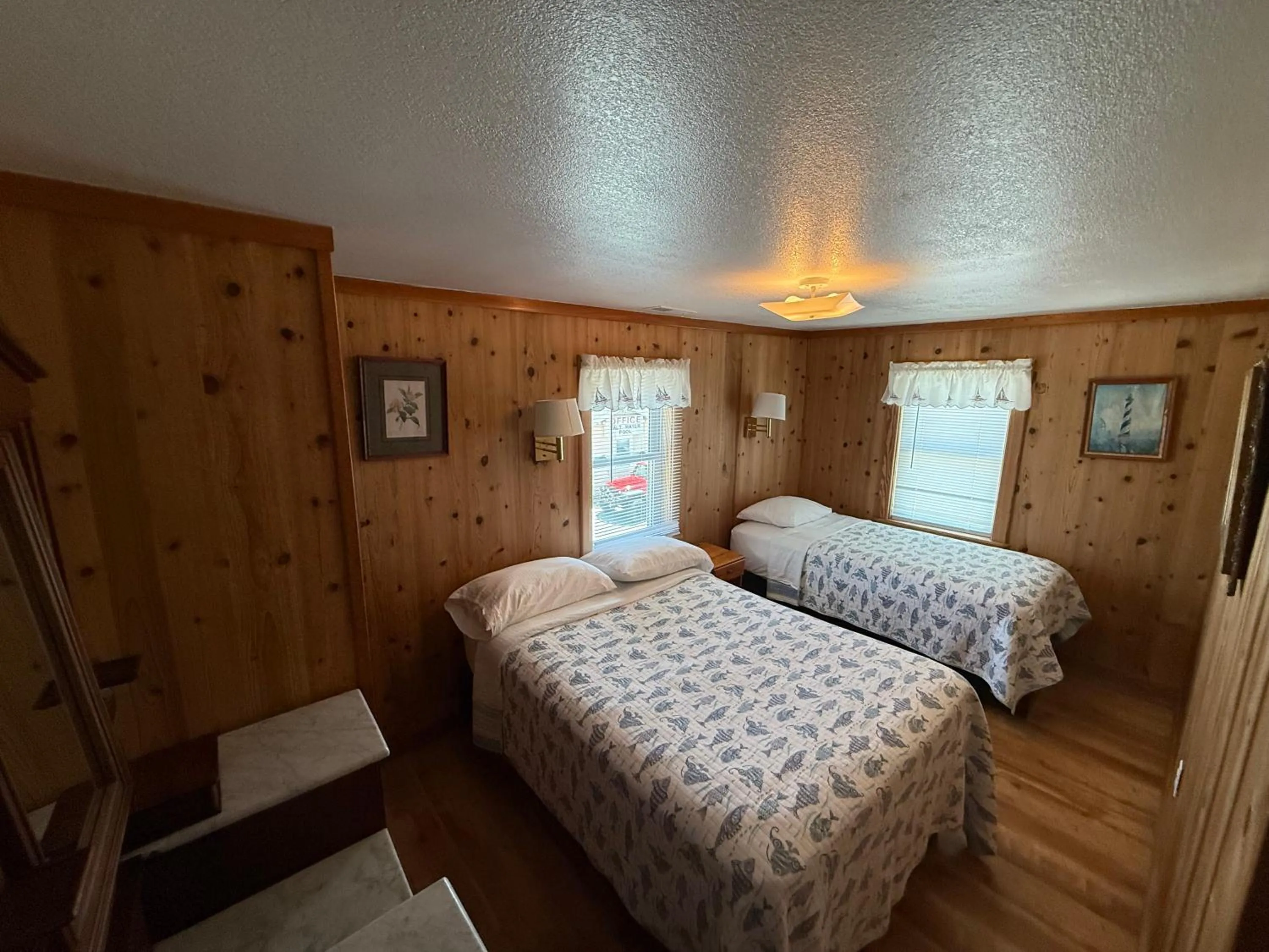 Bed in Outer Banks Motel - Village Accommodations