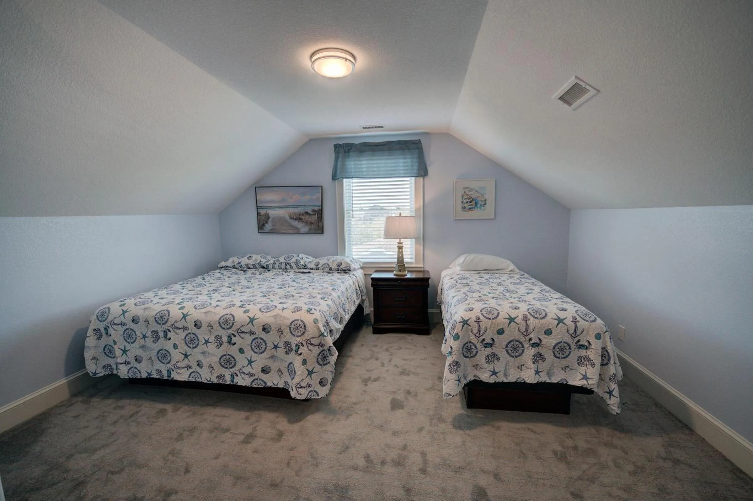 Bed in Outer Banks Motel - Village Accommodations