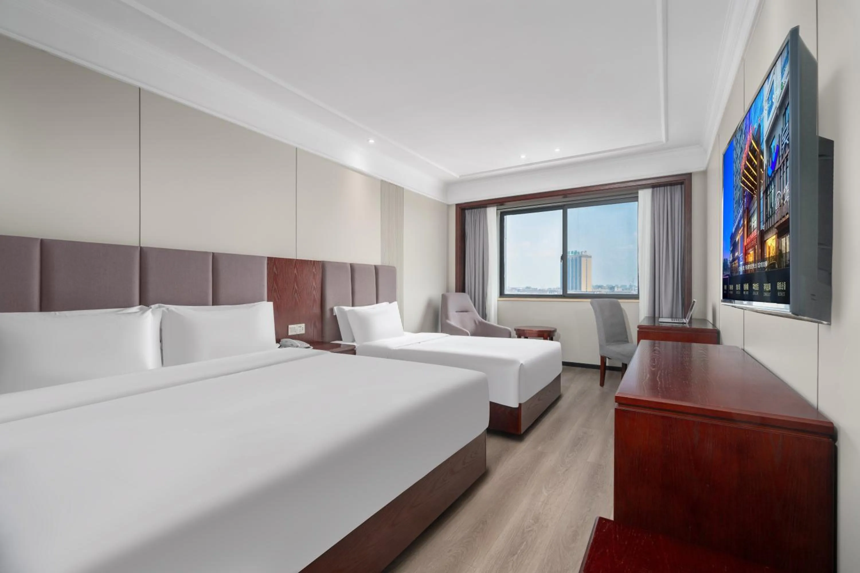 Bed in Huzhou Wealth Hotel