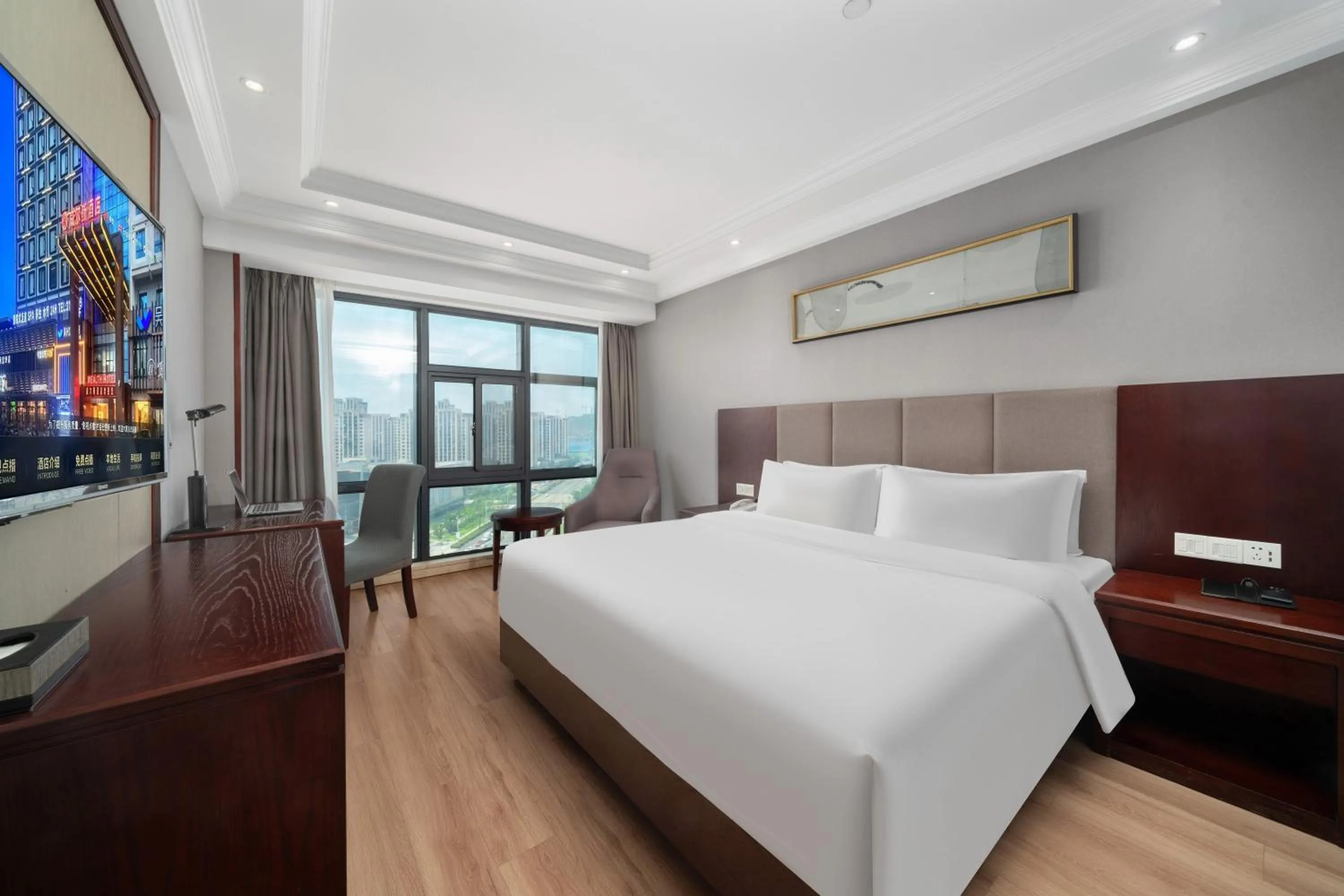 Bed in Huzhou Wealth Hotel