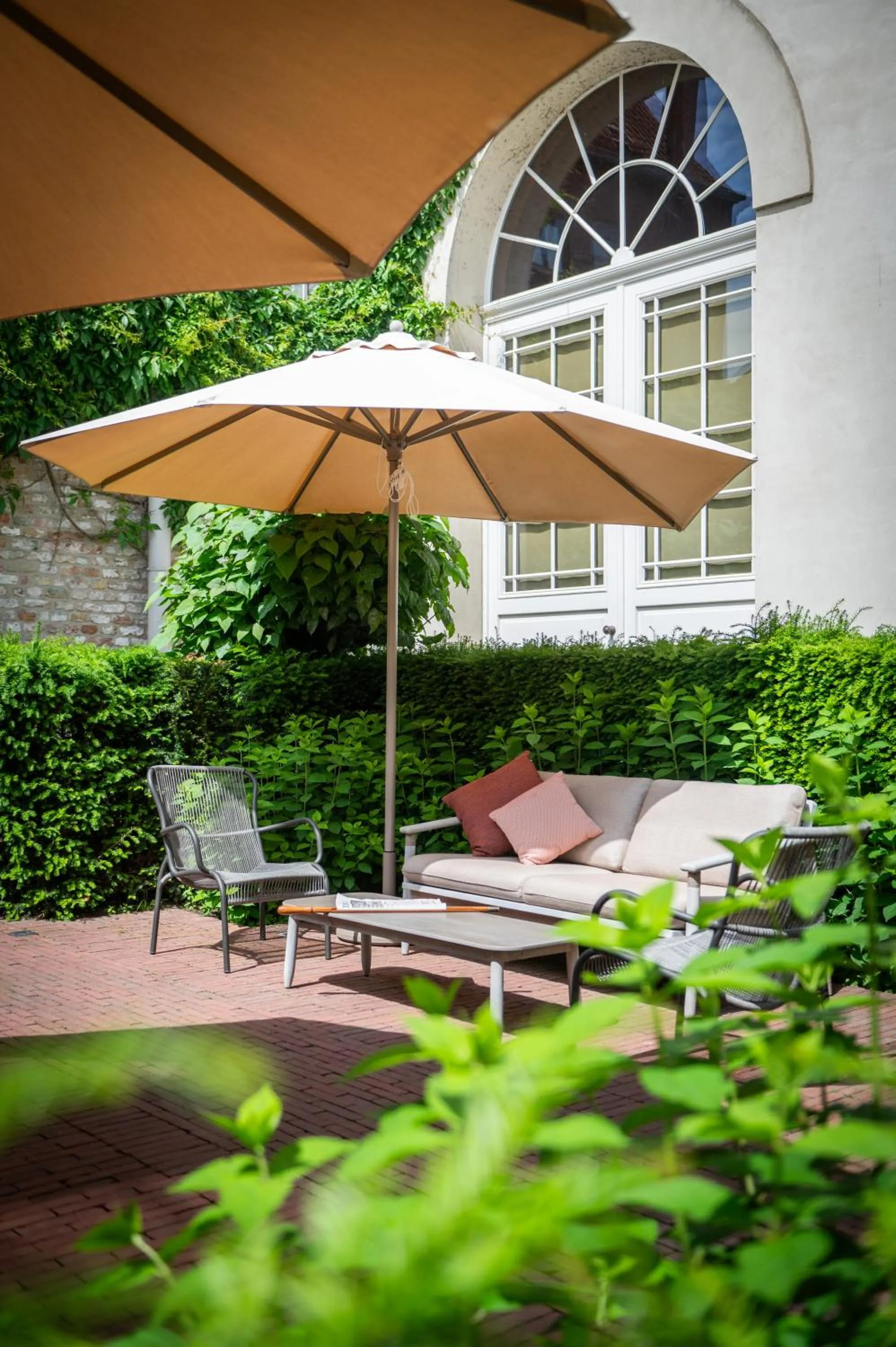Inner courtyard view in Dukes' Arches Brugge - by Dukes' Hotel Collection