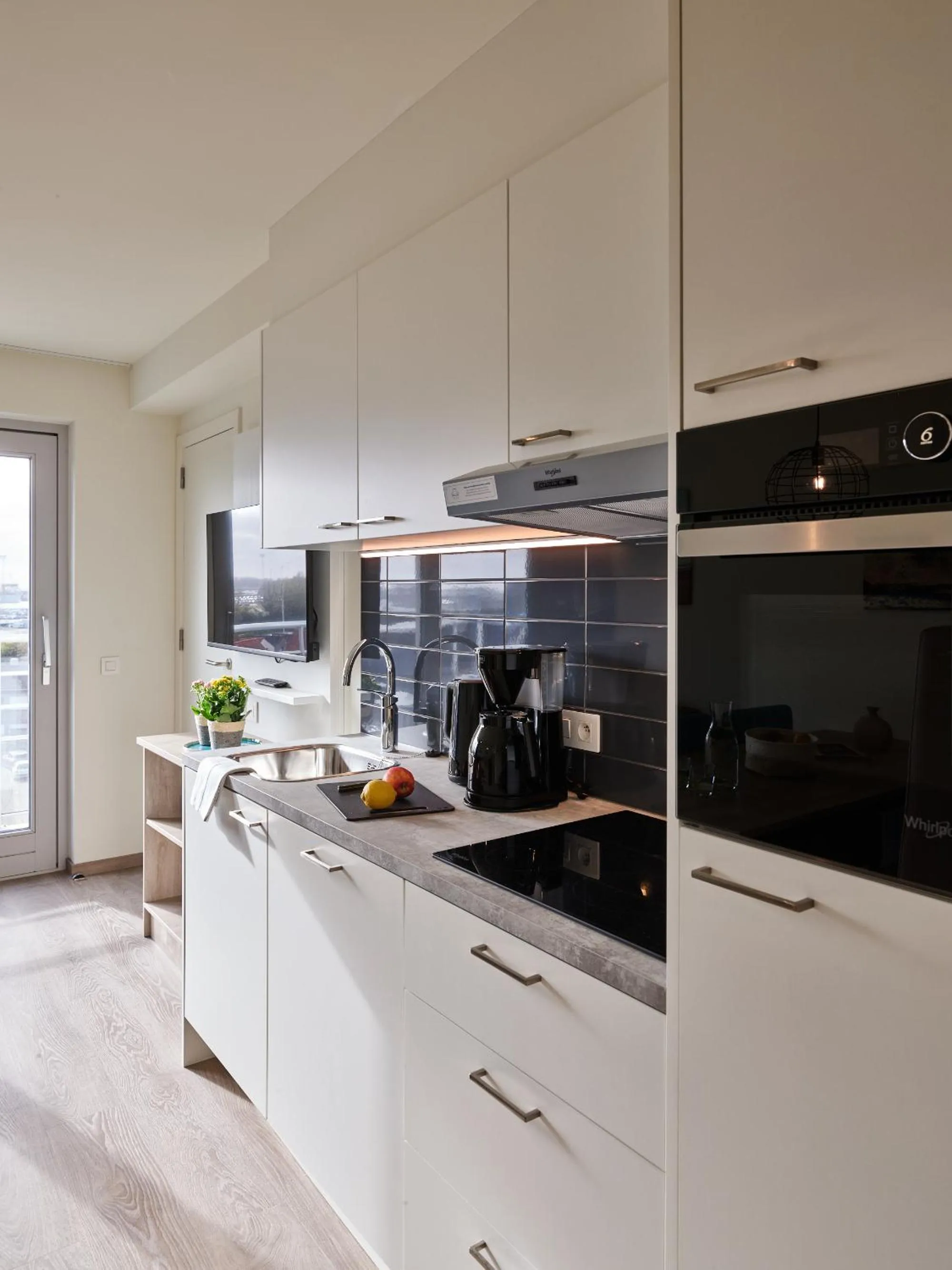 Kitchen or kitchenette in Holiday Suites Zeebrugge