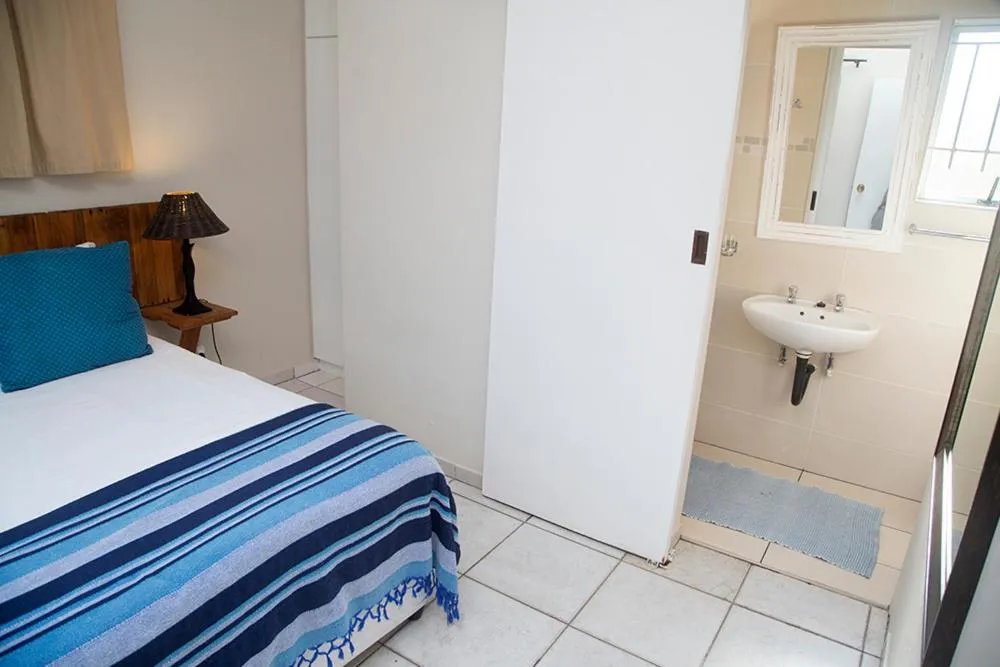Bed in Ansteys Beach Self Catering Apartments