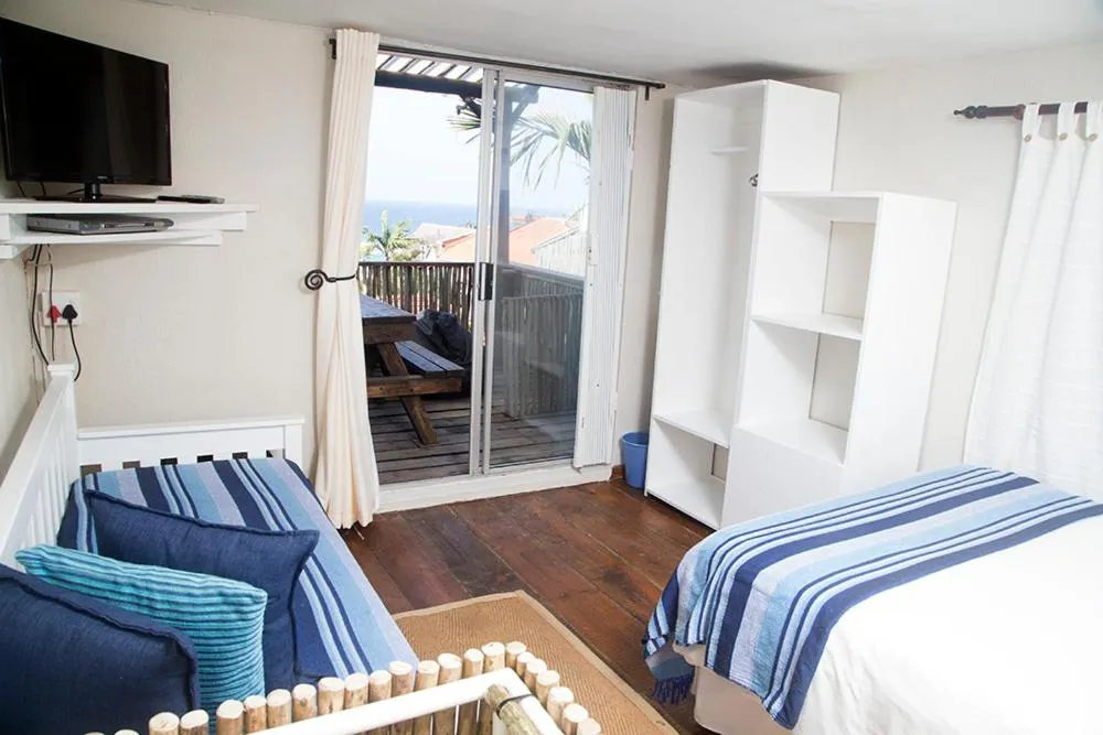 Bed in Ansteys Beach Self Catering Apartments