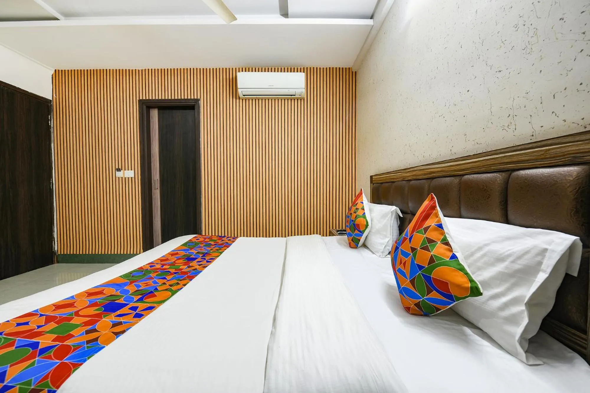 Bed in FabHotel Ess Pee Grand