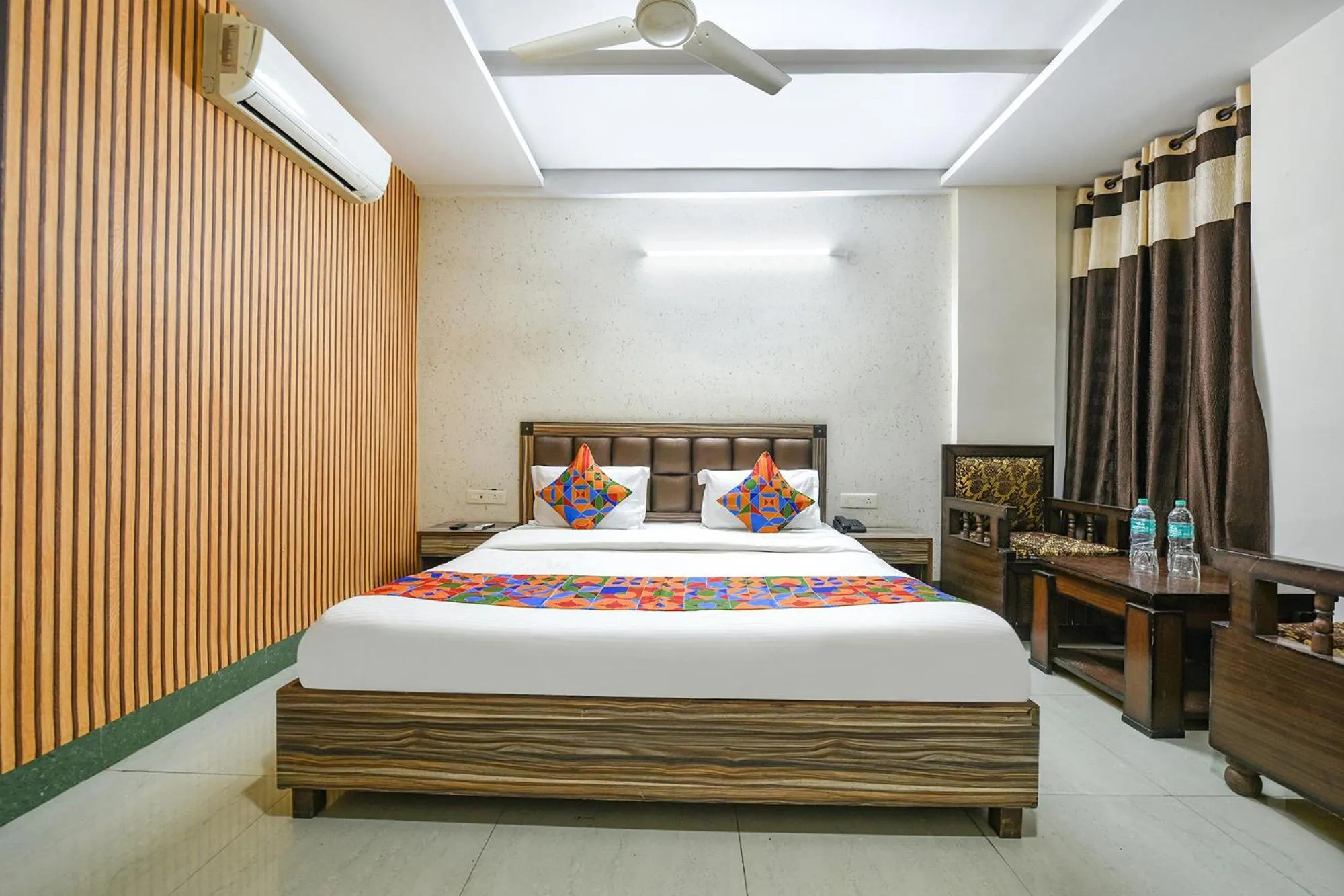 Bed in FabHotel Ess Pee Grand