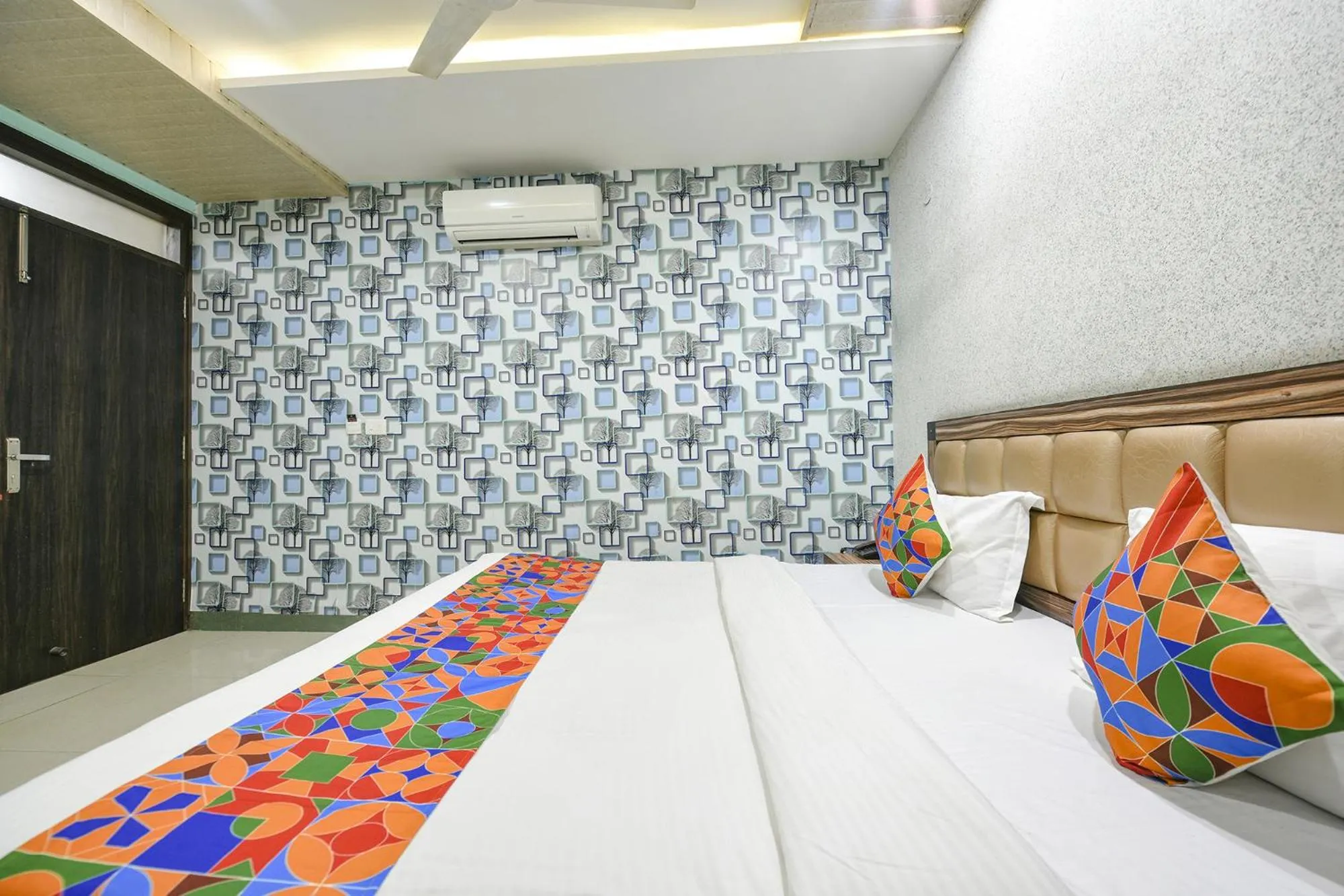 Bed in FabHotel Ess Pee Grand