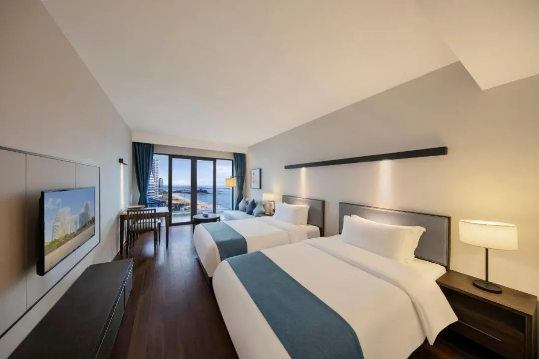 Bed in Howard Johnson Sandalwoods Resort Huizhou