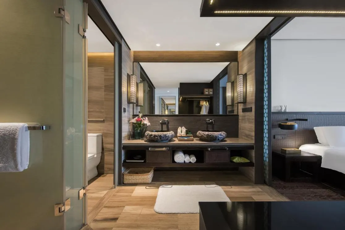 Bed in Howard Johnson Sandalwoods Resort Huizhou