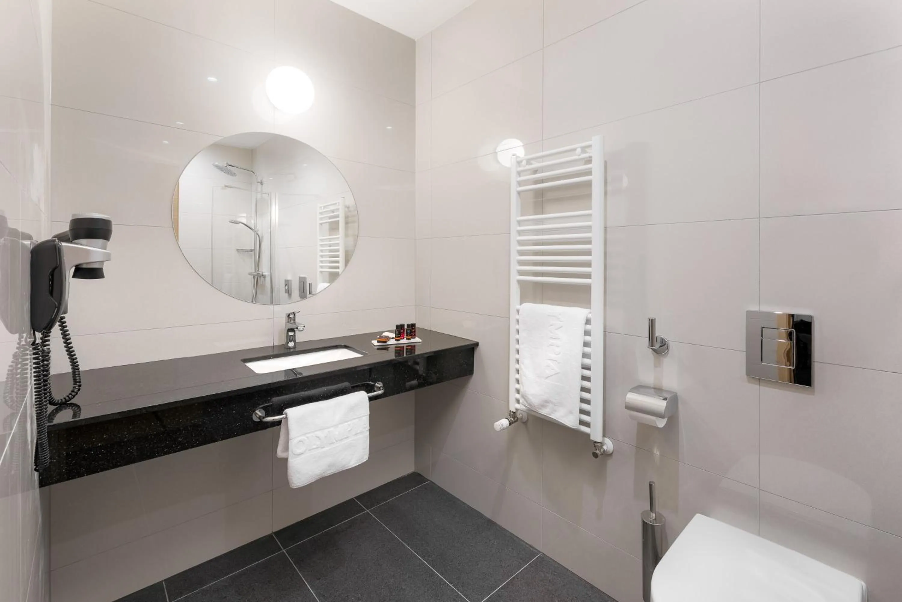 Bathroom in Hotel Olympia Sky