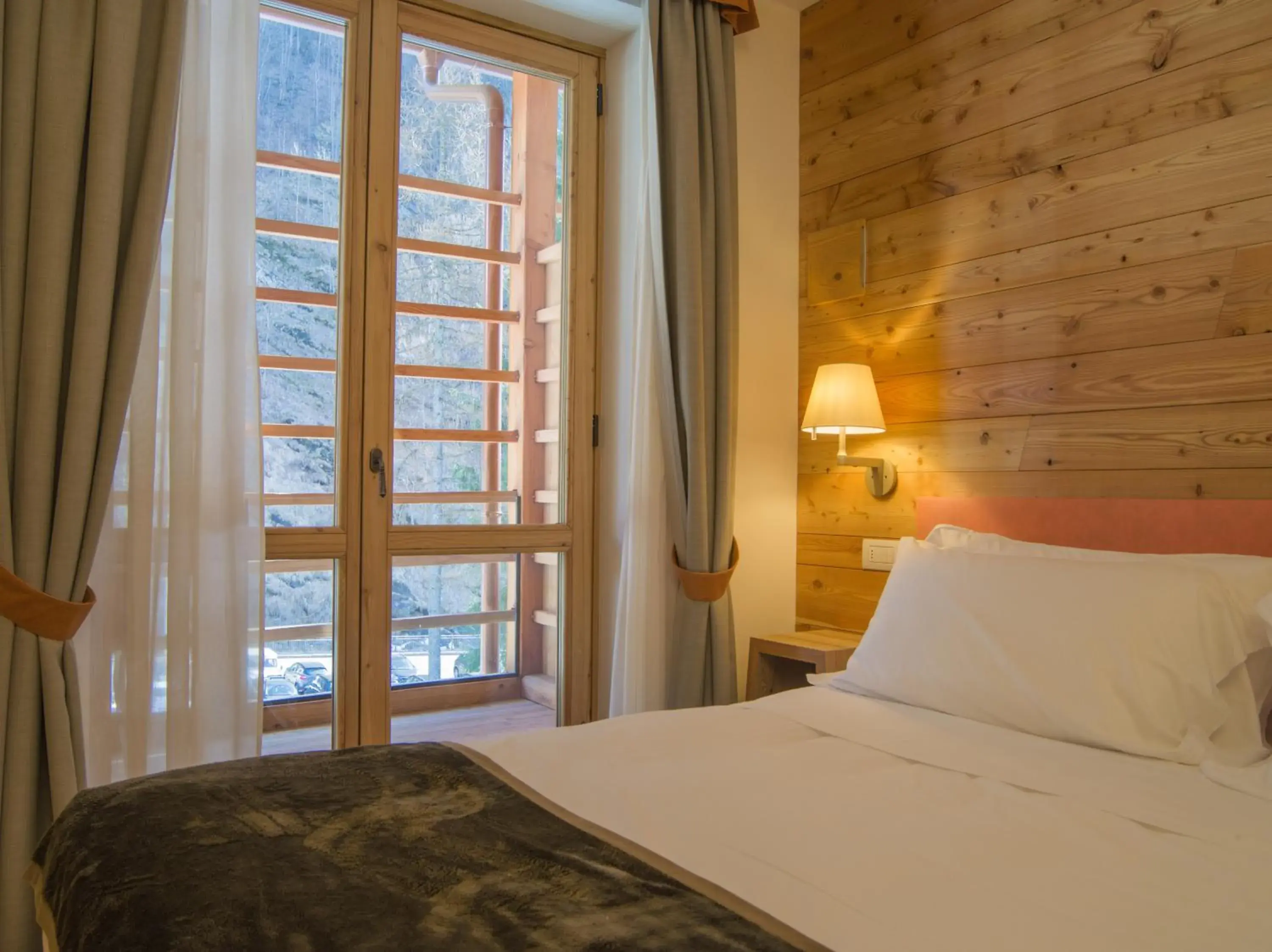 Comfort Quadruple Room in Alagna Mountain Resort & SPA Comfort Quadruple Room in Alagna Mountain Resort & SPA