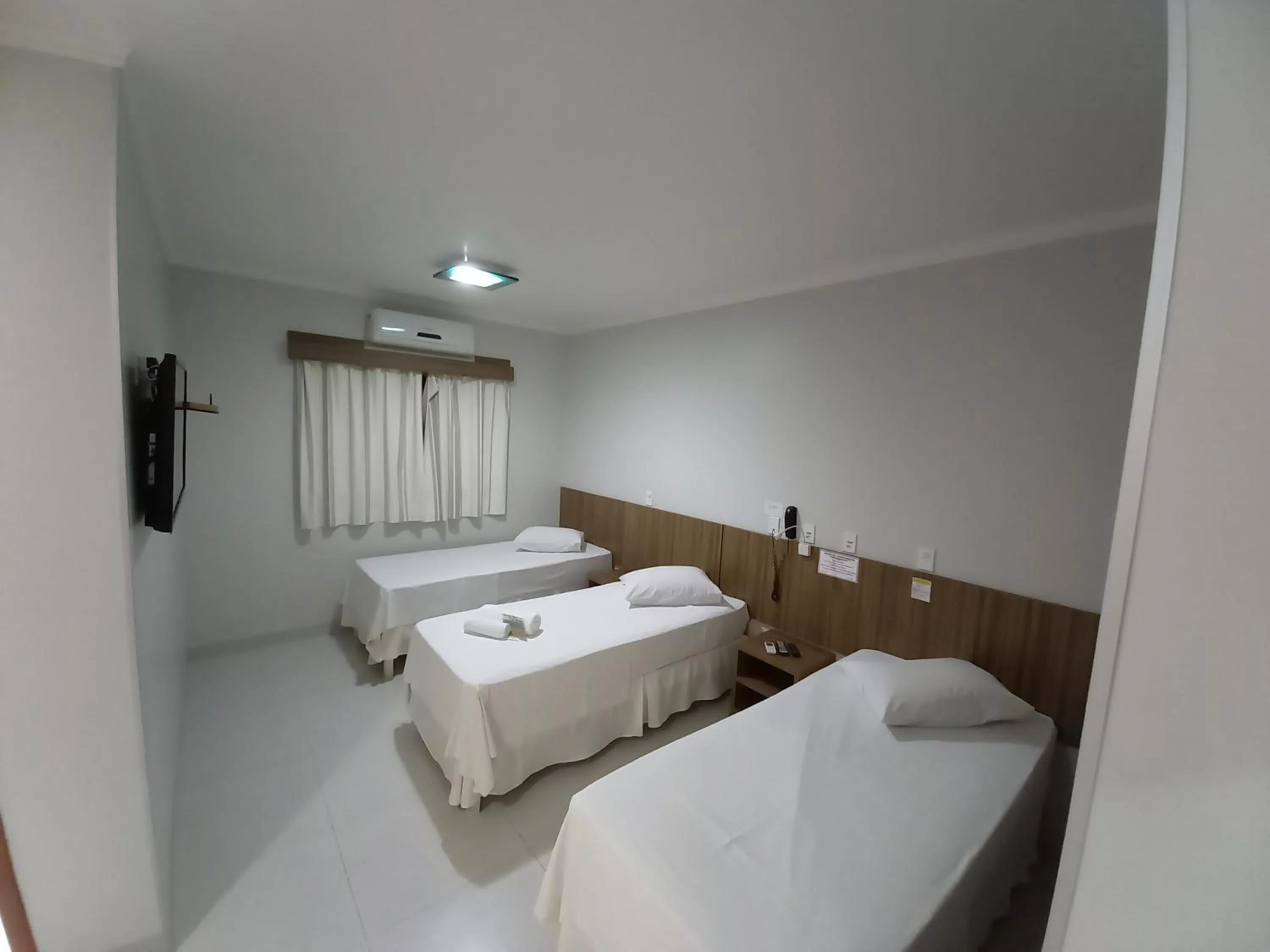 Bed in Hotel Mandino