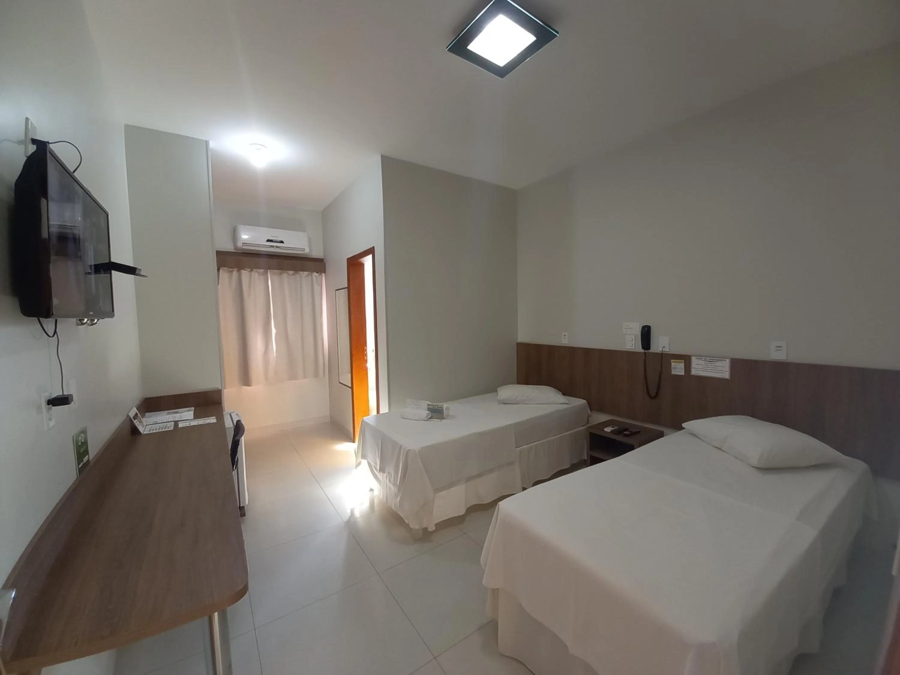 Bed in Hotel Mandino