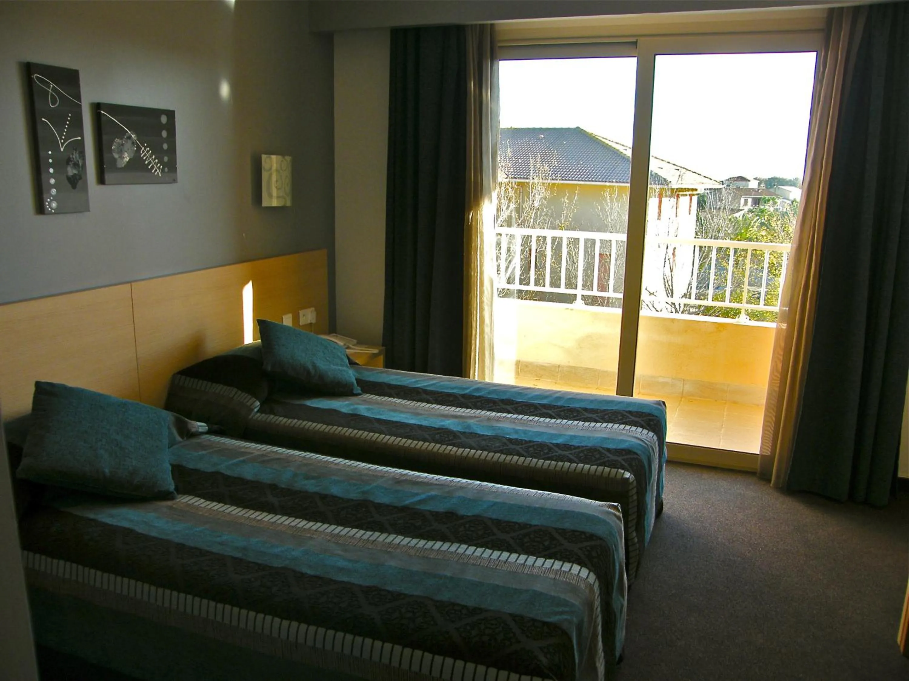 Bedroom in Hôtel Restaurant L' Empereur