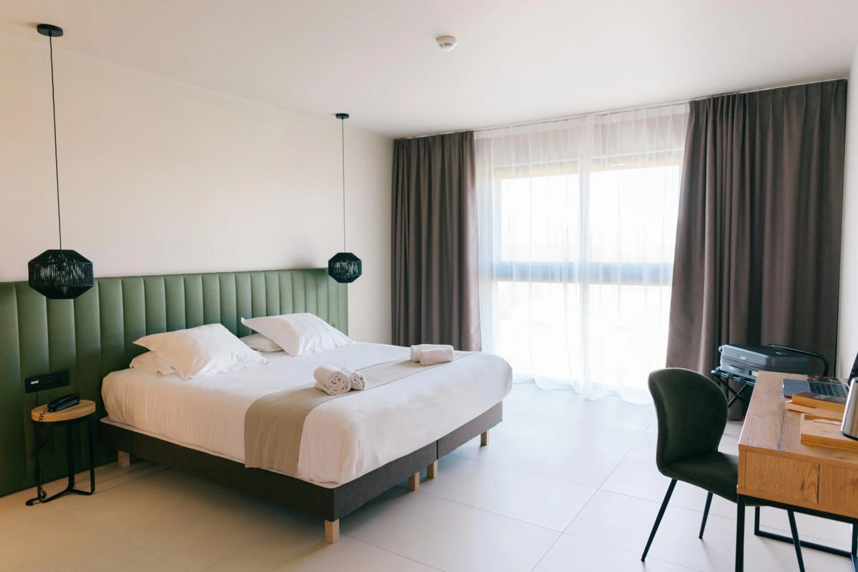 Seating area, Bed in Hôtel Spa Restaurant La Madrague