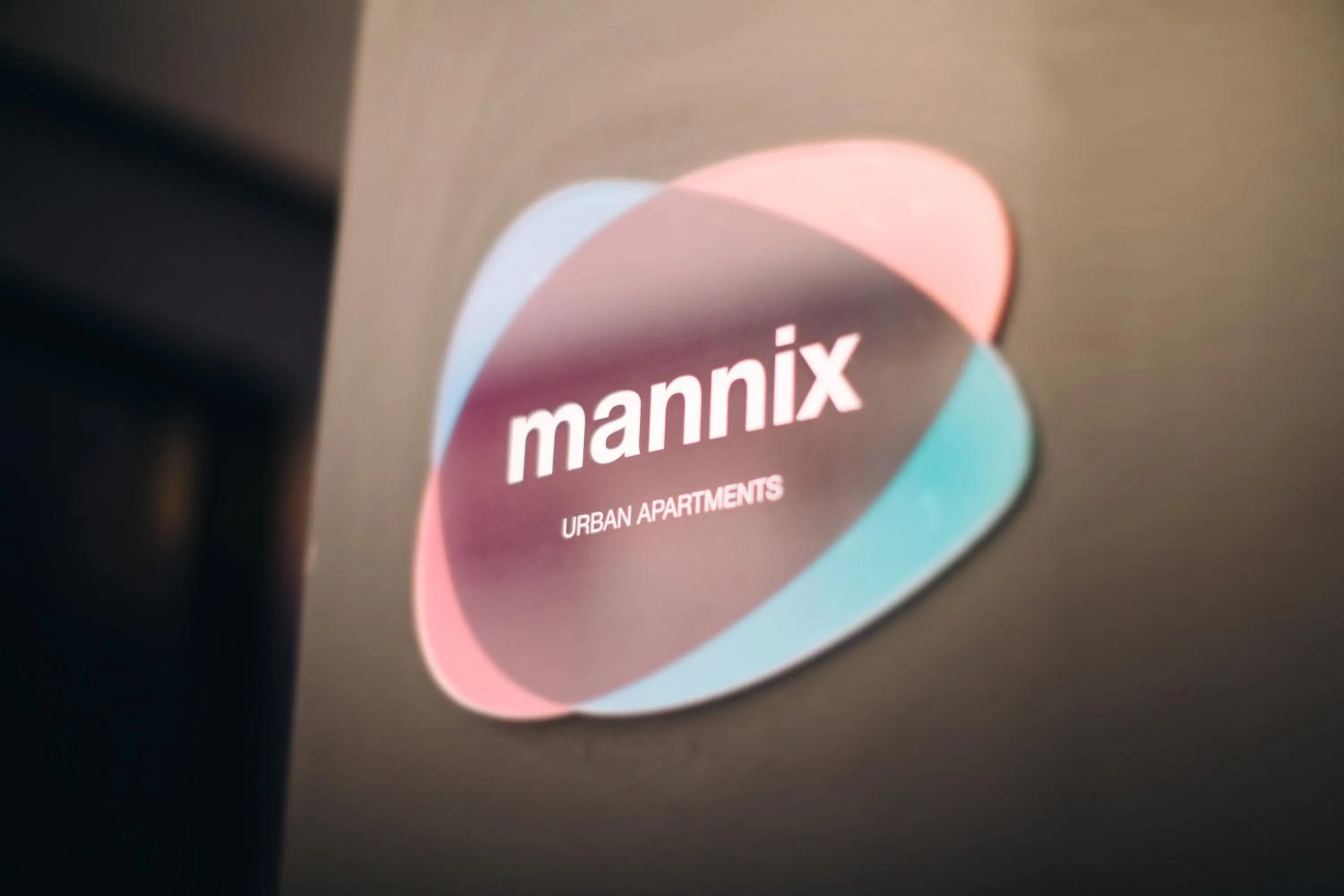 Property logo or sign in Mannix Urban Apartments