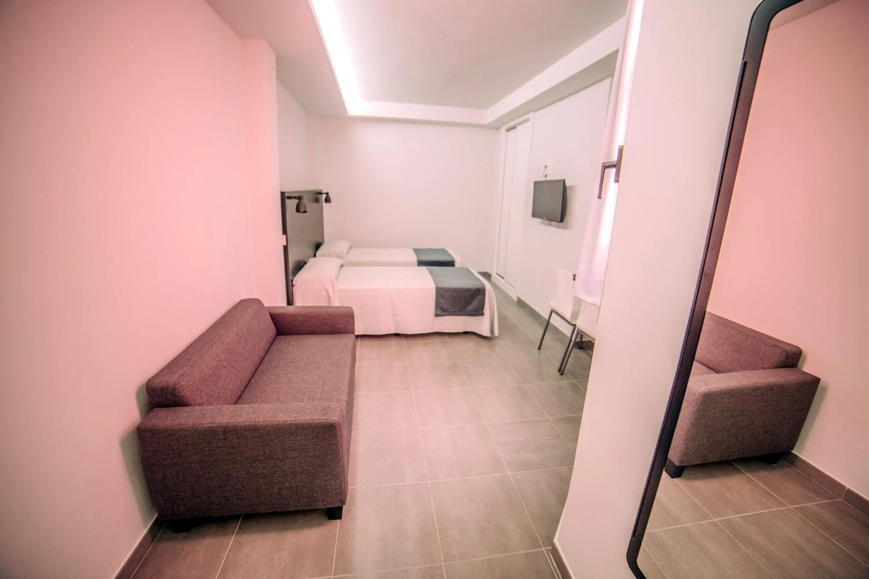 Photo of the whole room, Bed in Mannix Urban Apartments